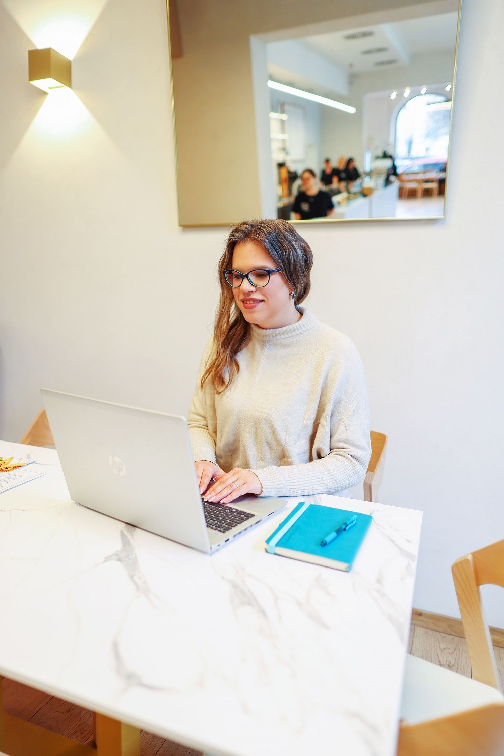 Shopify growth expert working on a laptop during a website design and strategy session