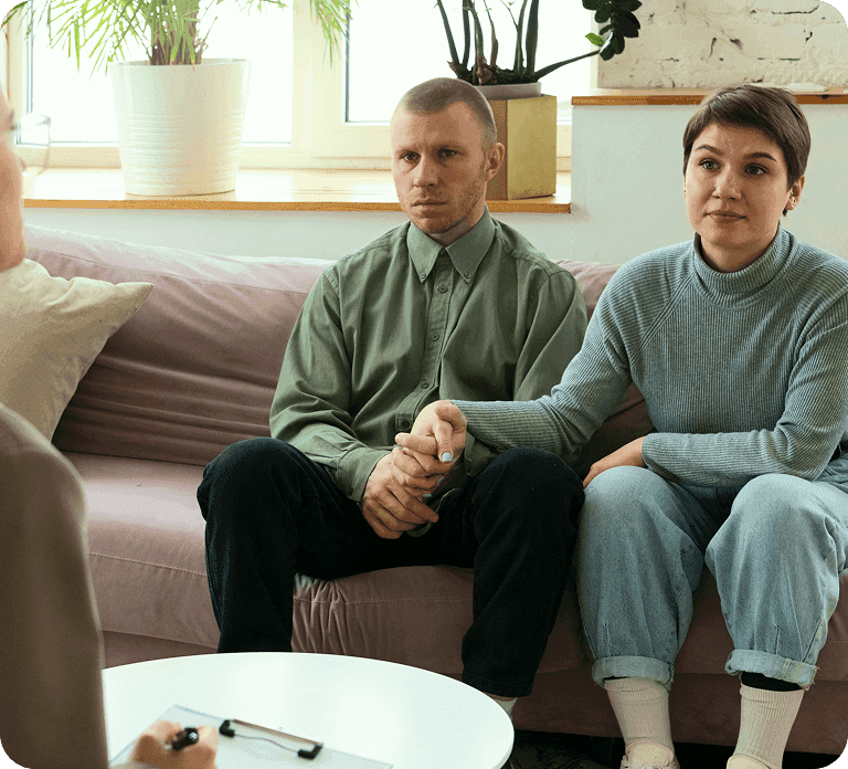 Couple seeking support therapist listening