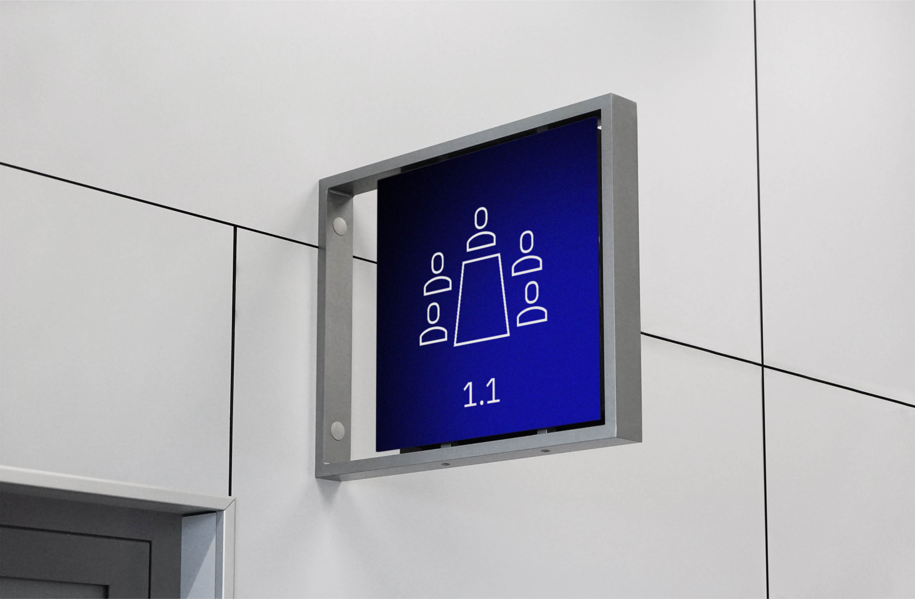 Conference room sign with meeting icon and room number 1.1.
