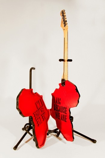 red electric guitar with the shape of a butterfly's wing