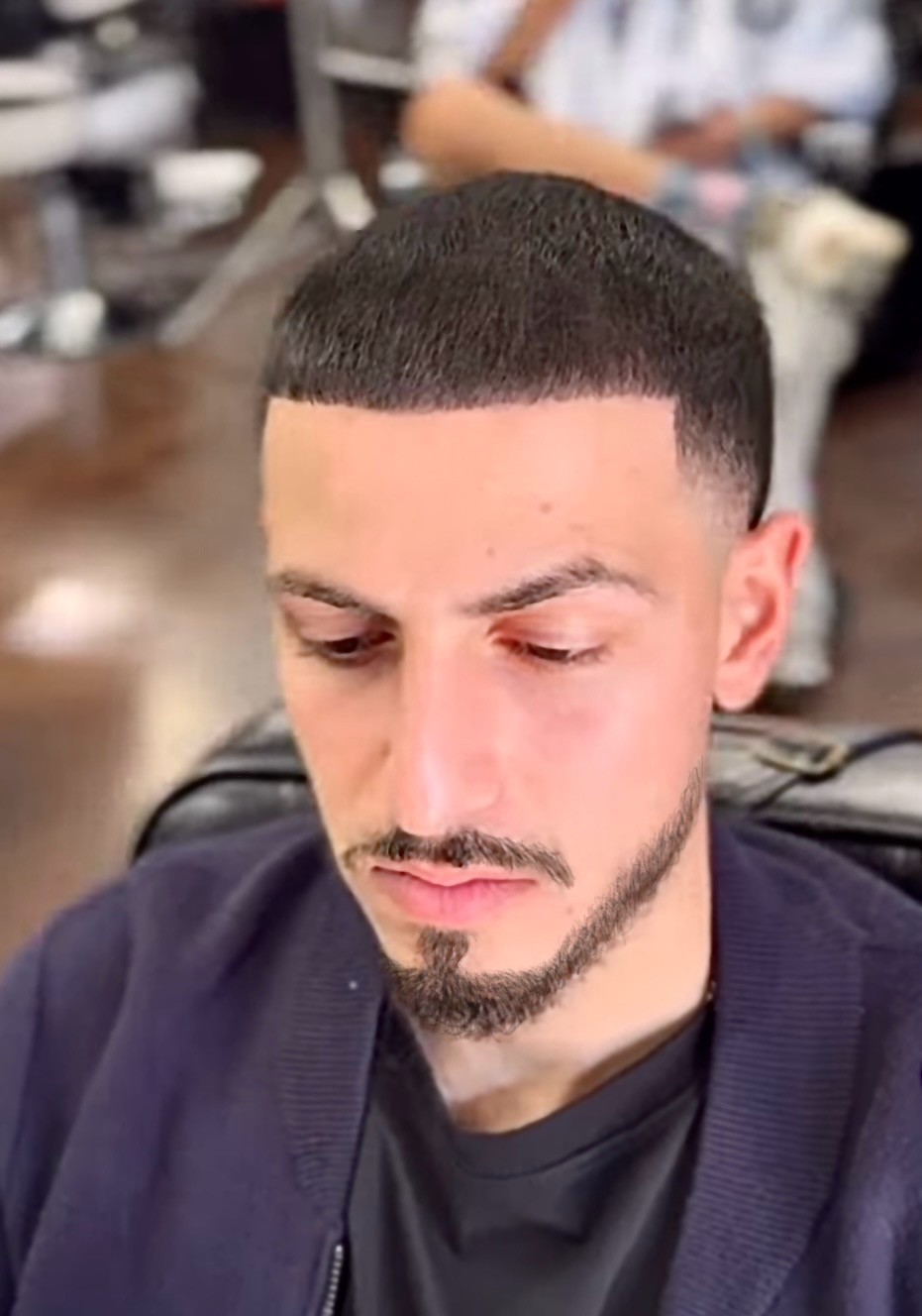 Persian gentlemen’s fade featuring spray enhancements, a sharp hairline, and a youthful finish