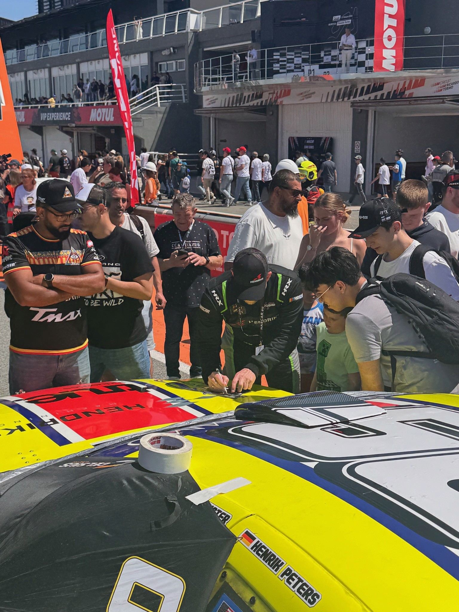Henrik Peters signing an autograph for a fan