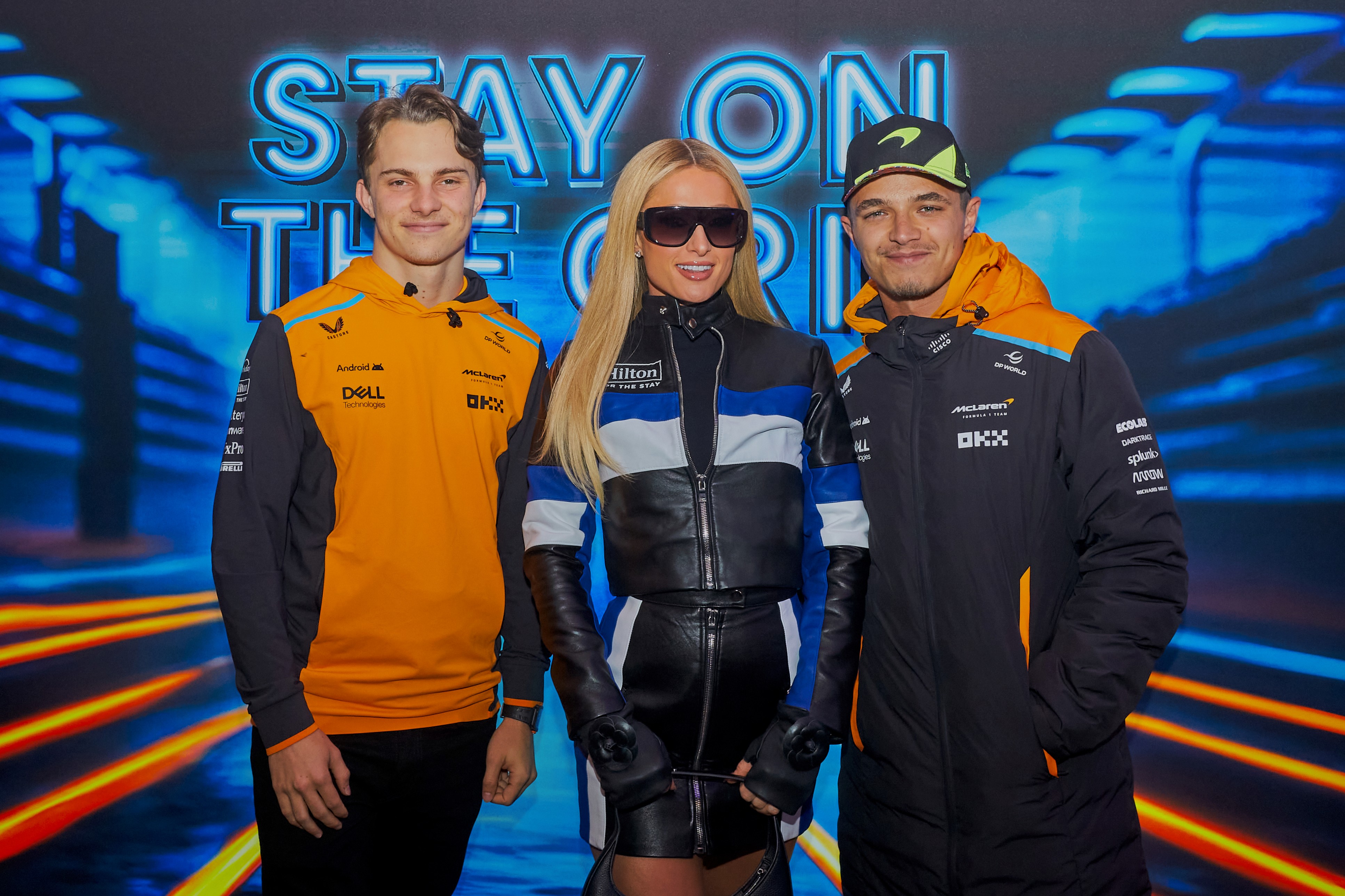 Lando Norris and Oscar Piastri, McLaren drivers with Paris Hilton from Hilton Hotels, Formula 1 photographer Paul Severn