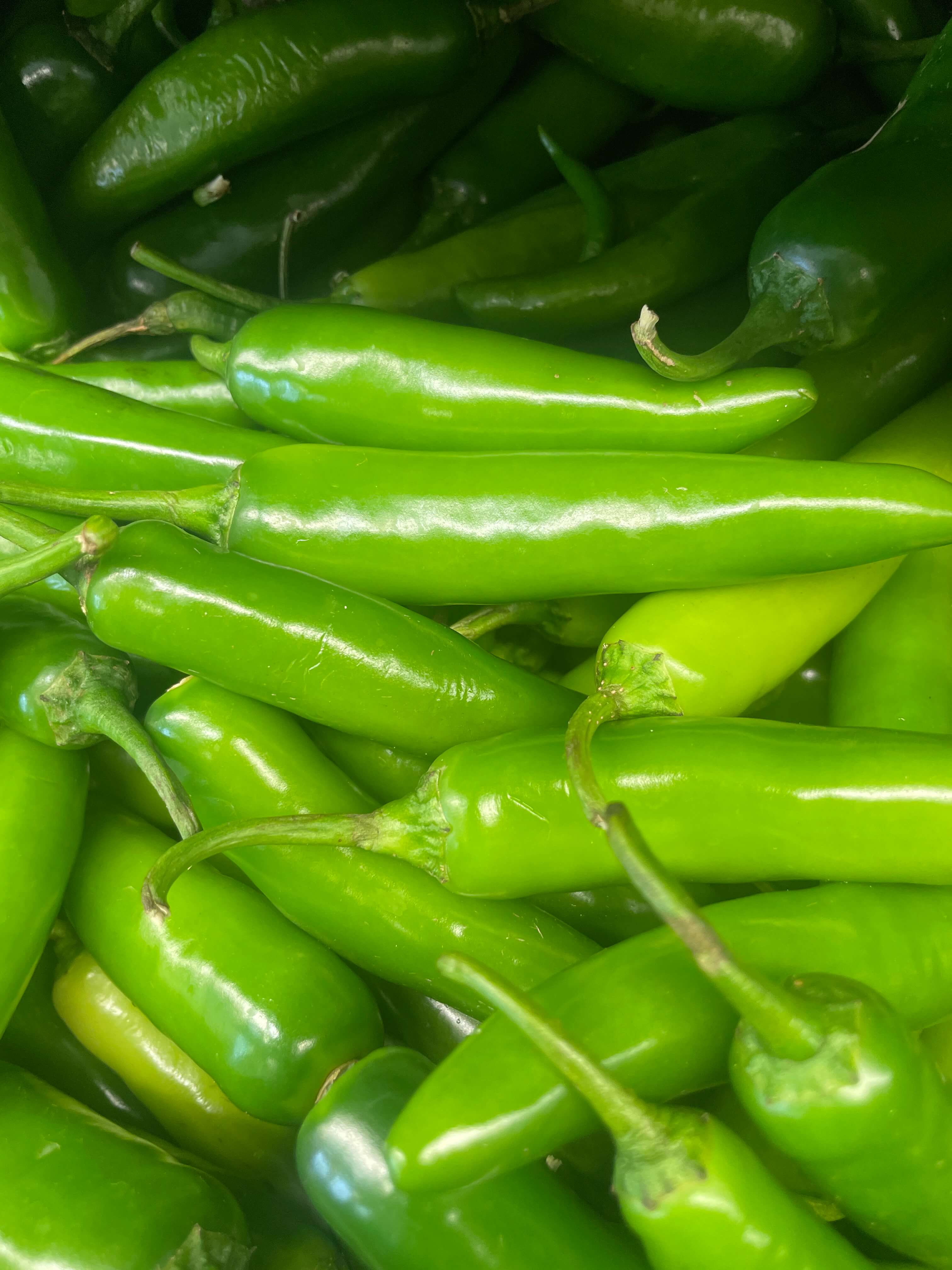 Fresh green chili peppers at International Food Market Orlando.