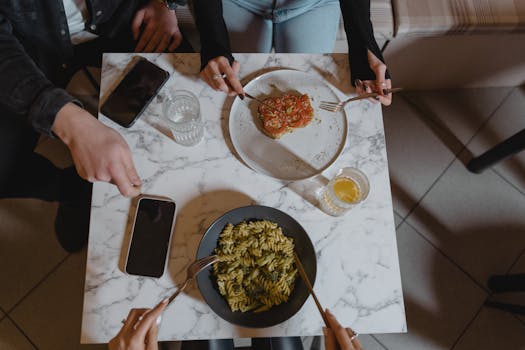 Restaurant Table with Plates and Phones