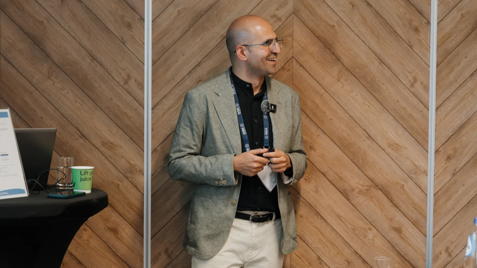 Ernesto laughing at the presentation 