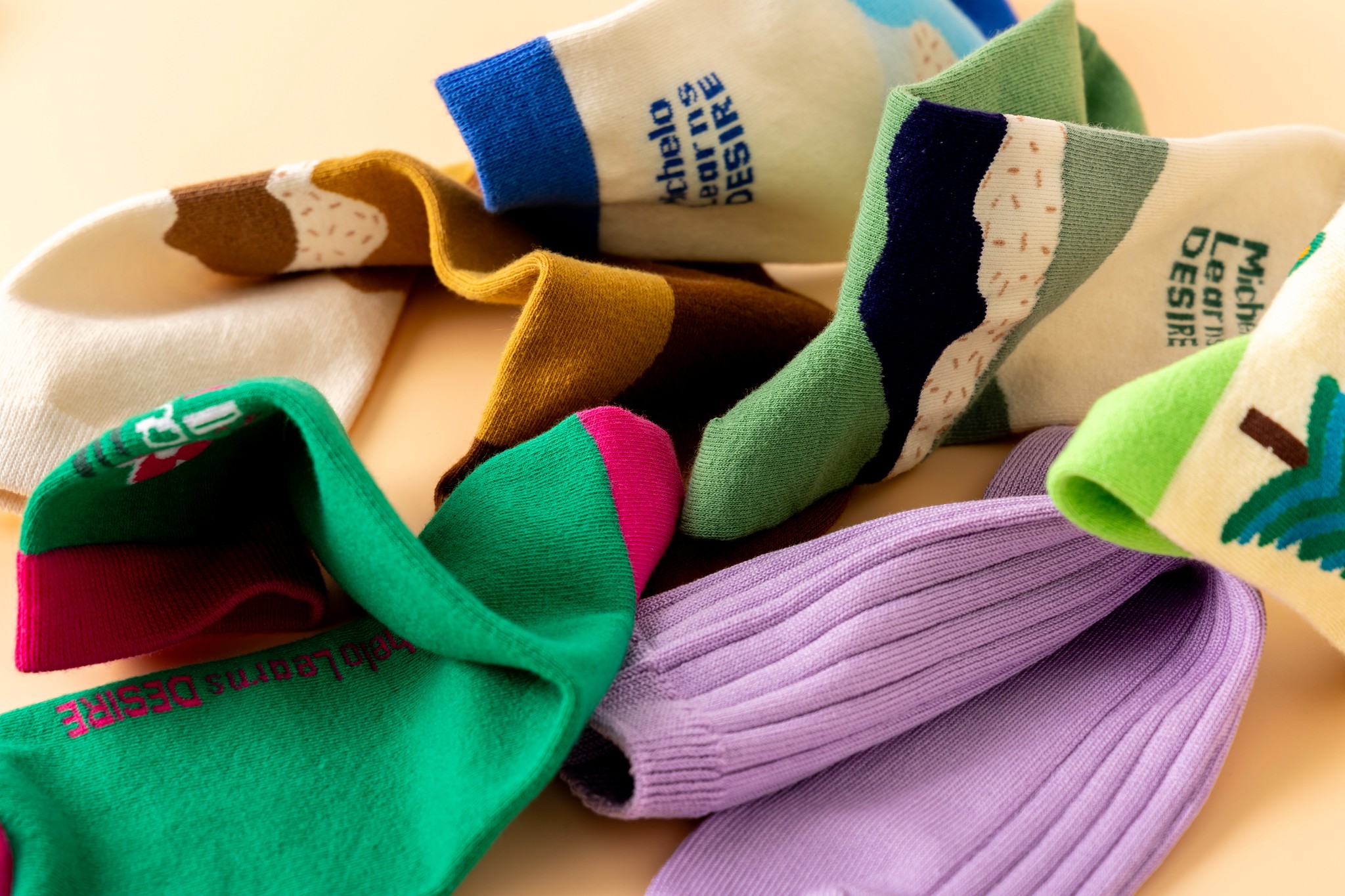 a person using white and orange tenis on a desert