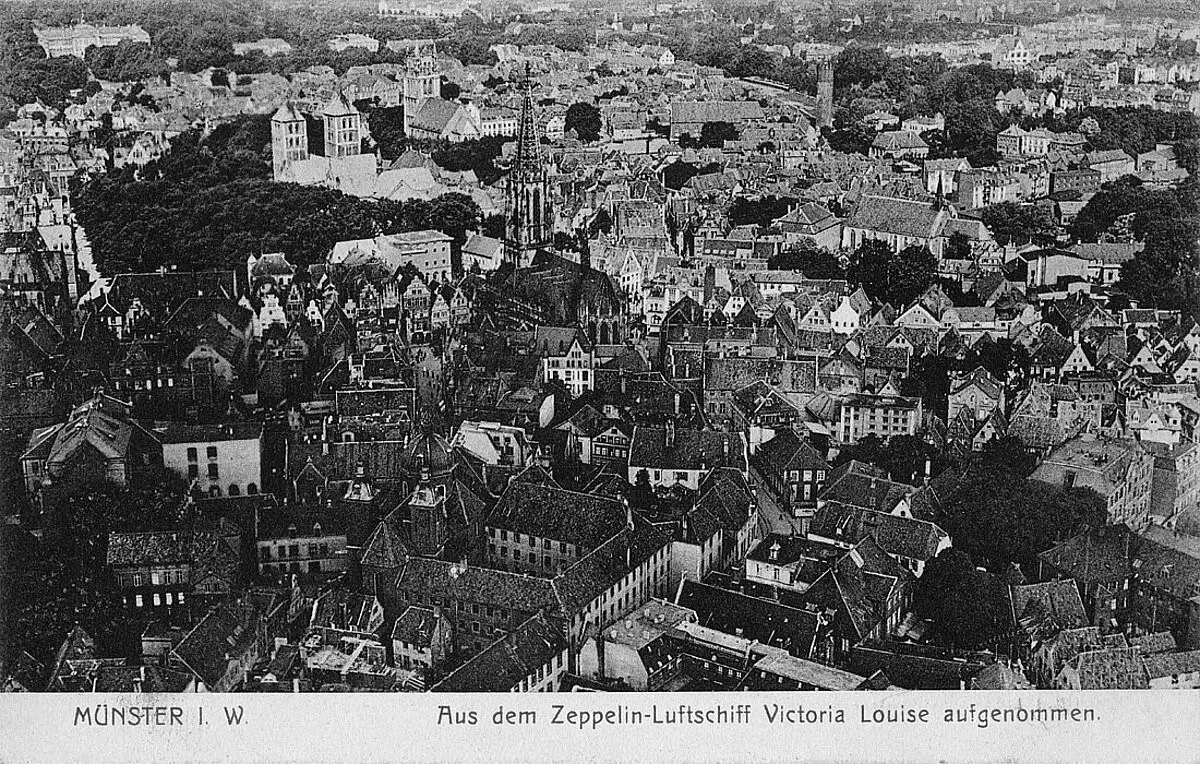 Isometrische Zeichnung eines Bauprojekts mit mehreren Gebäuden und markierten Strukturen in Rot