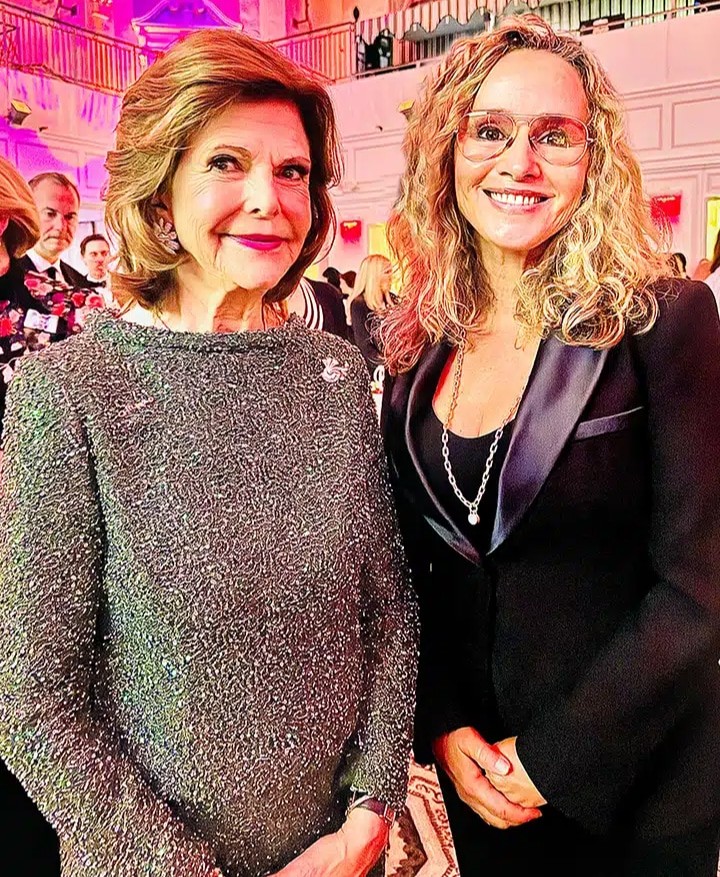 Queen Silvia and Lisa Kristine|Lisa Kristine smiling with Queen Silvia