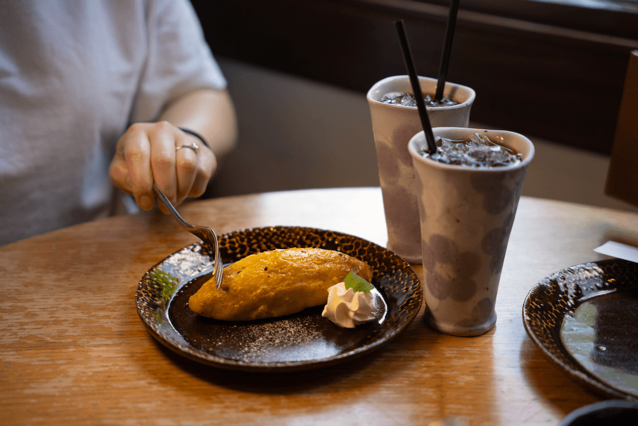 Sweet potato dessert being eaten at Cocoro Cafe