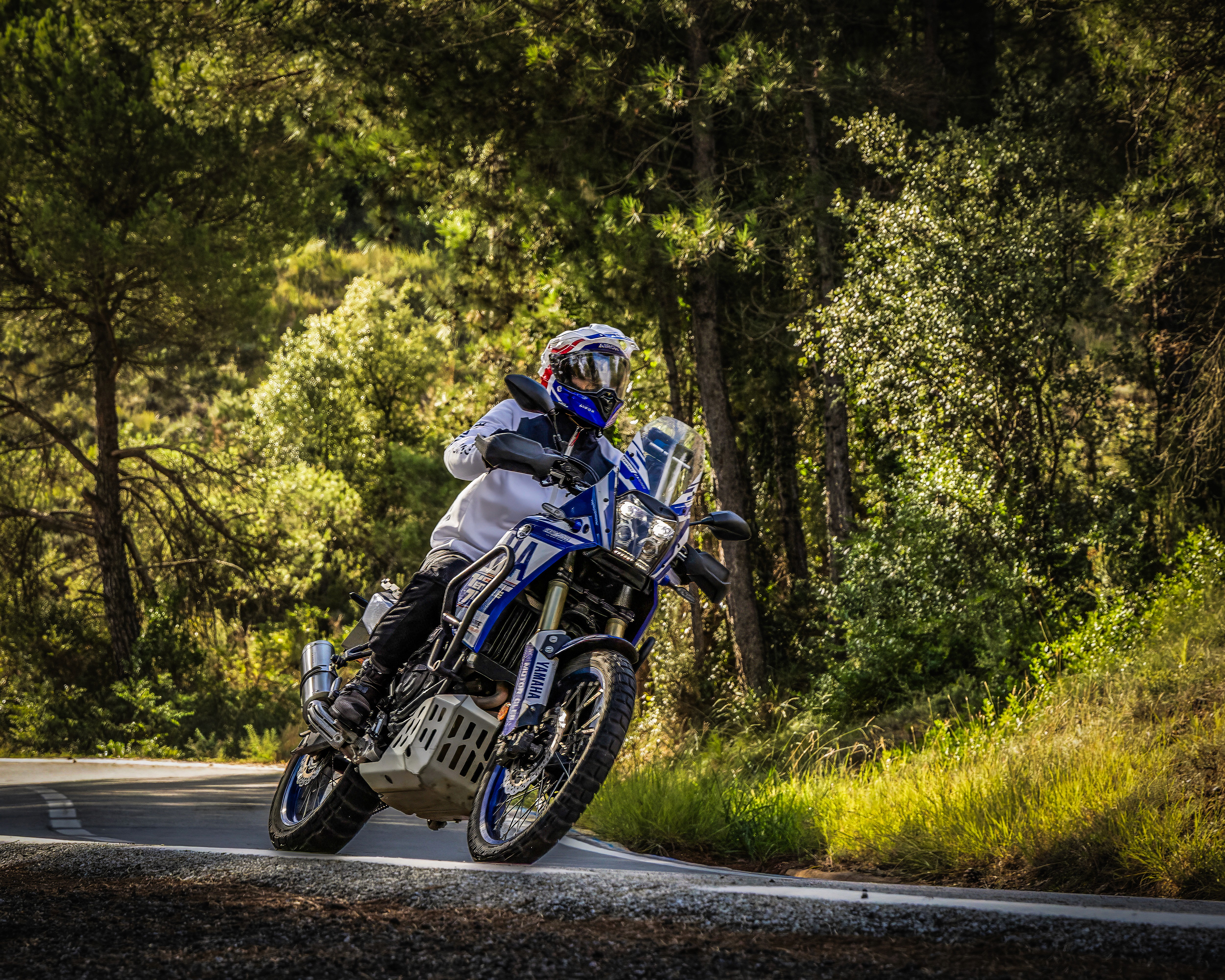 Interior of a car featuring sleek, modern seats, illuminated in a dark setting, emphasizing design and luxury.