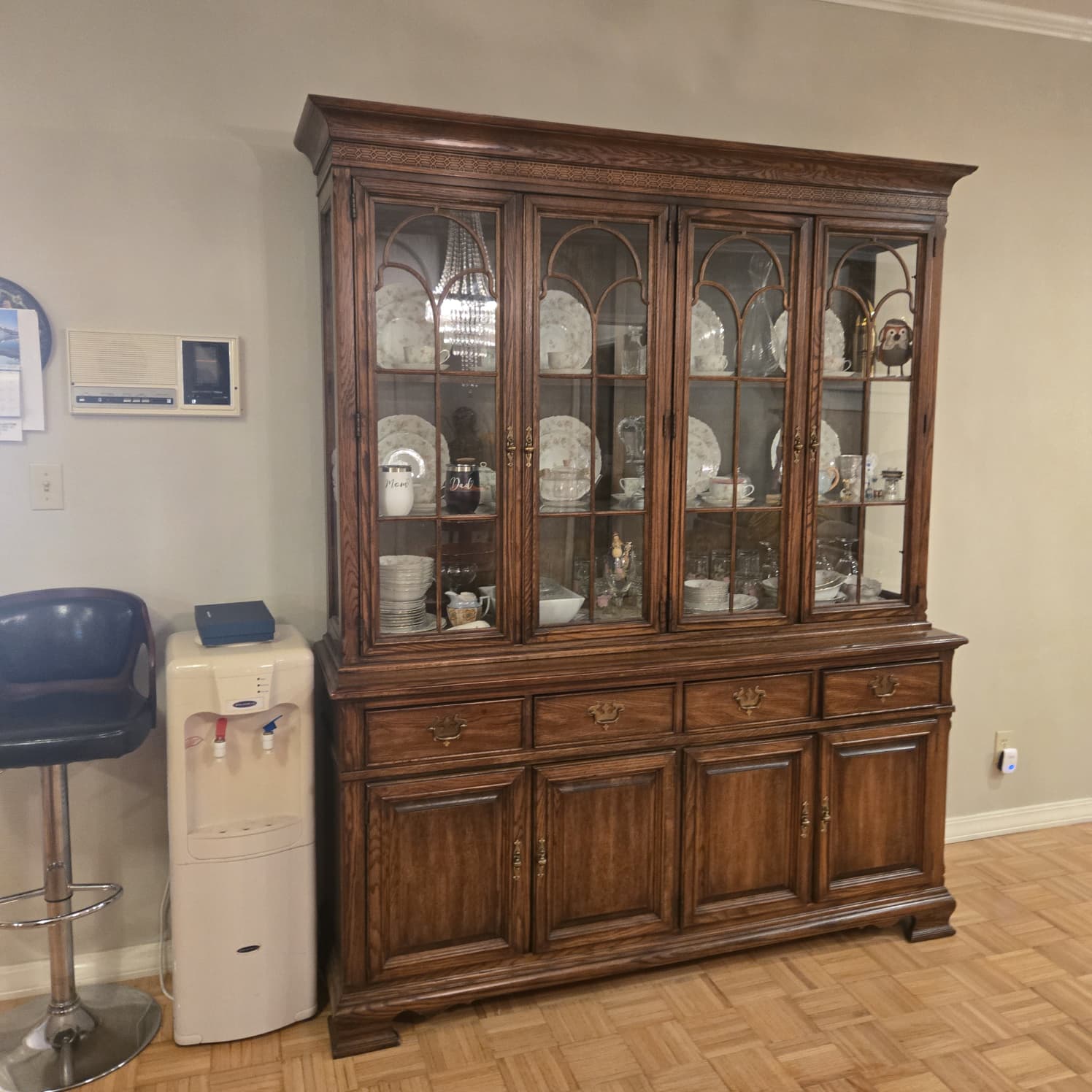 white wooden kitchen cabinet with black pendant lamp