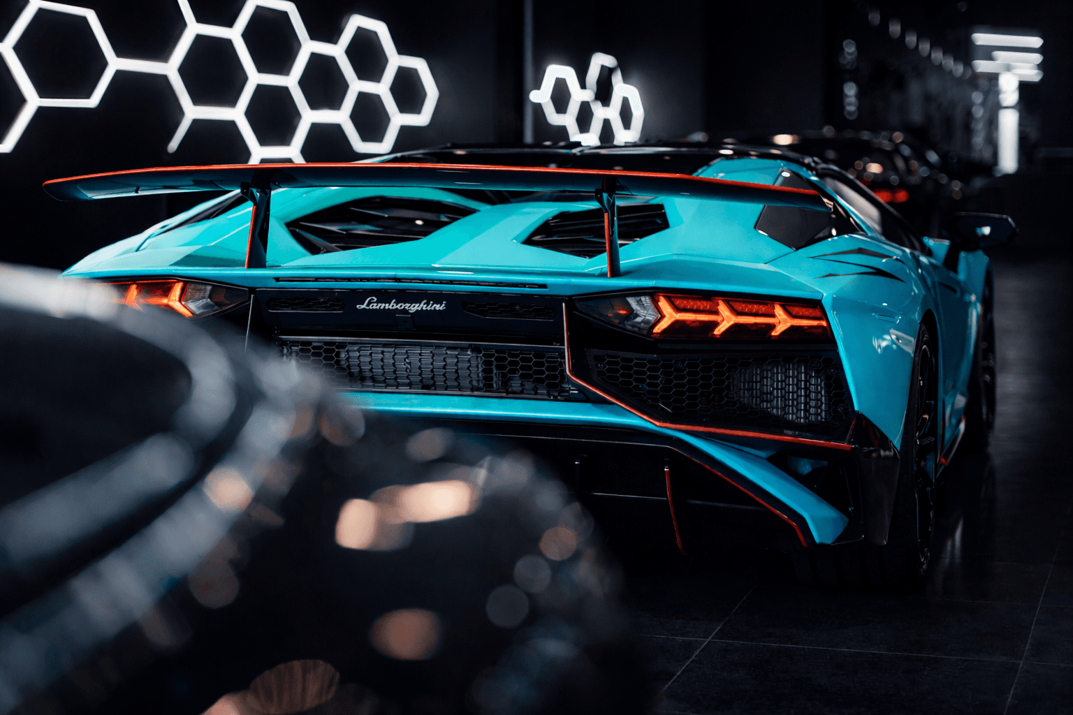 black car with white plastic cup on top