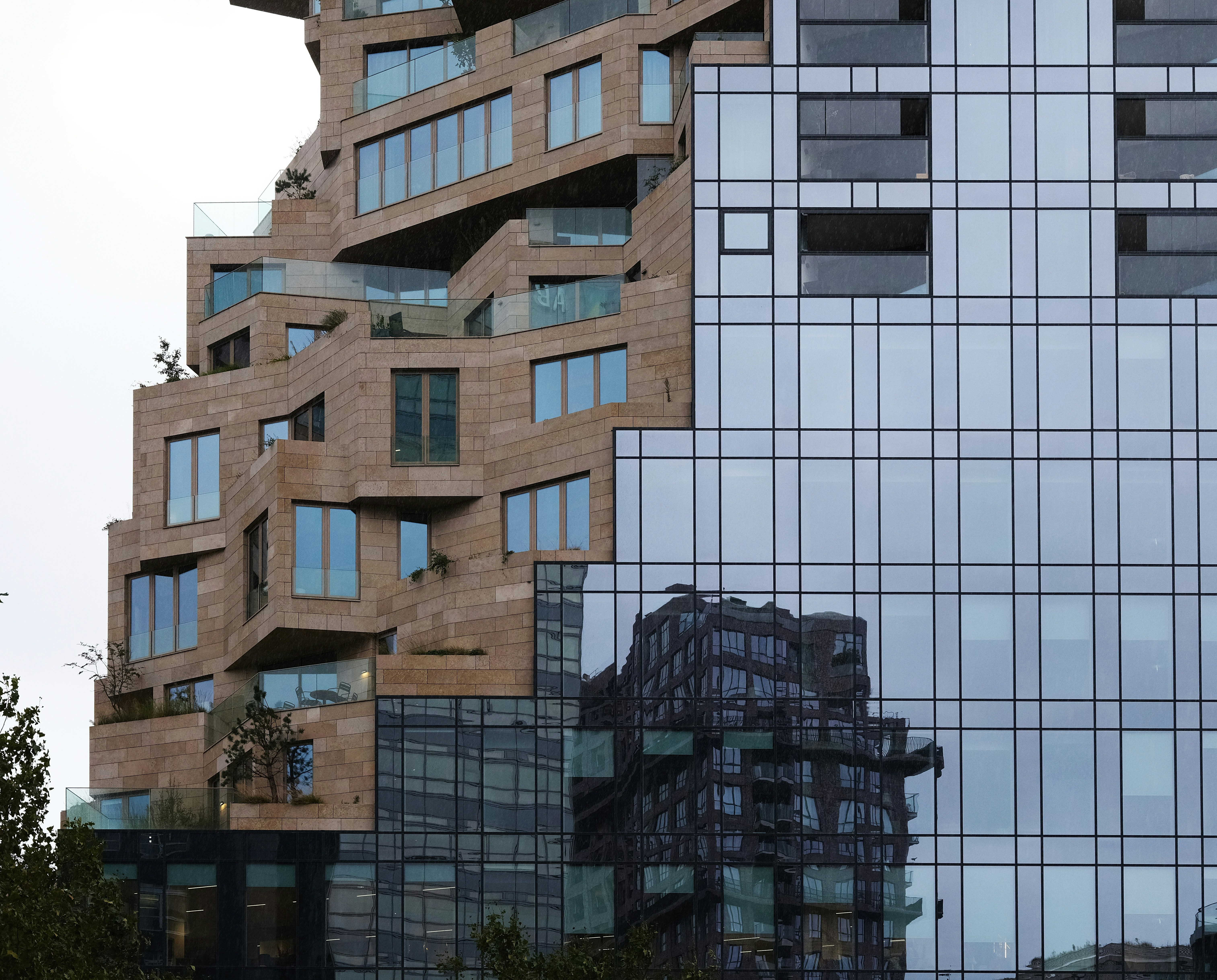 a very tall building next to a very tall building