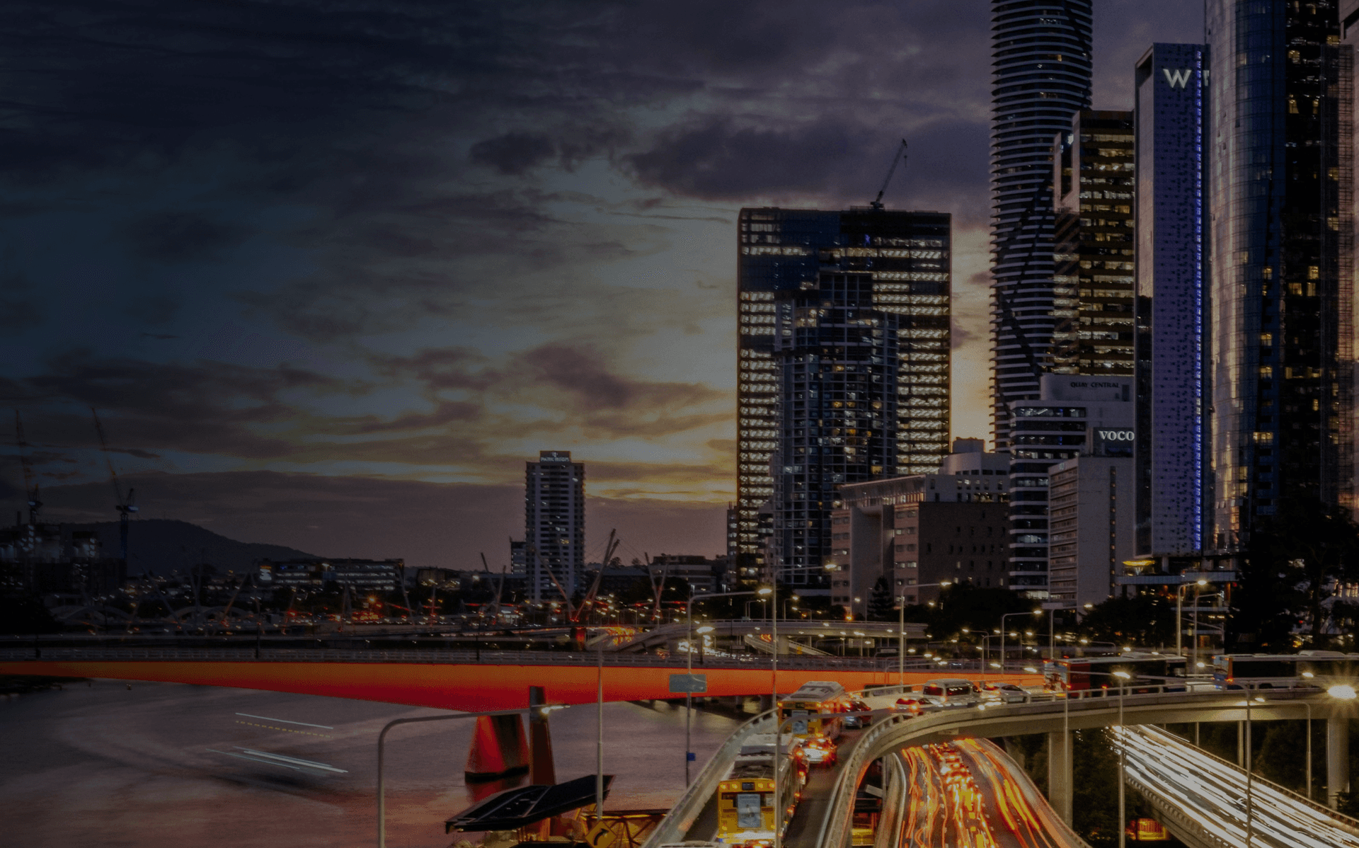 City lights and traffic at dusk.