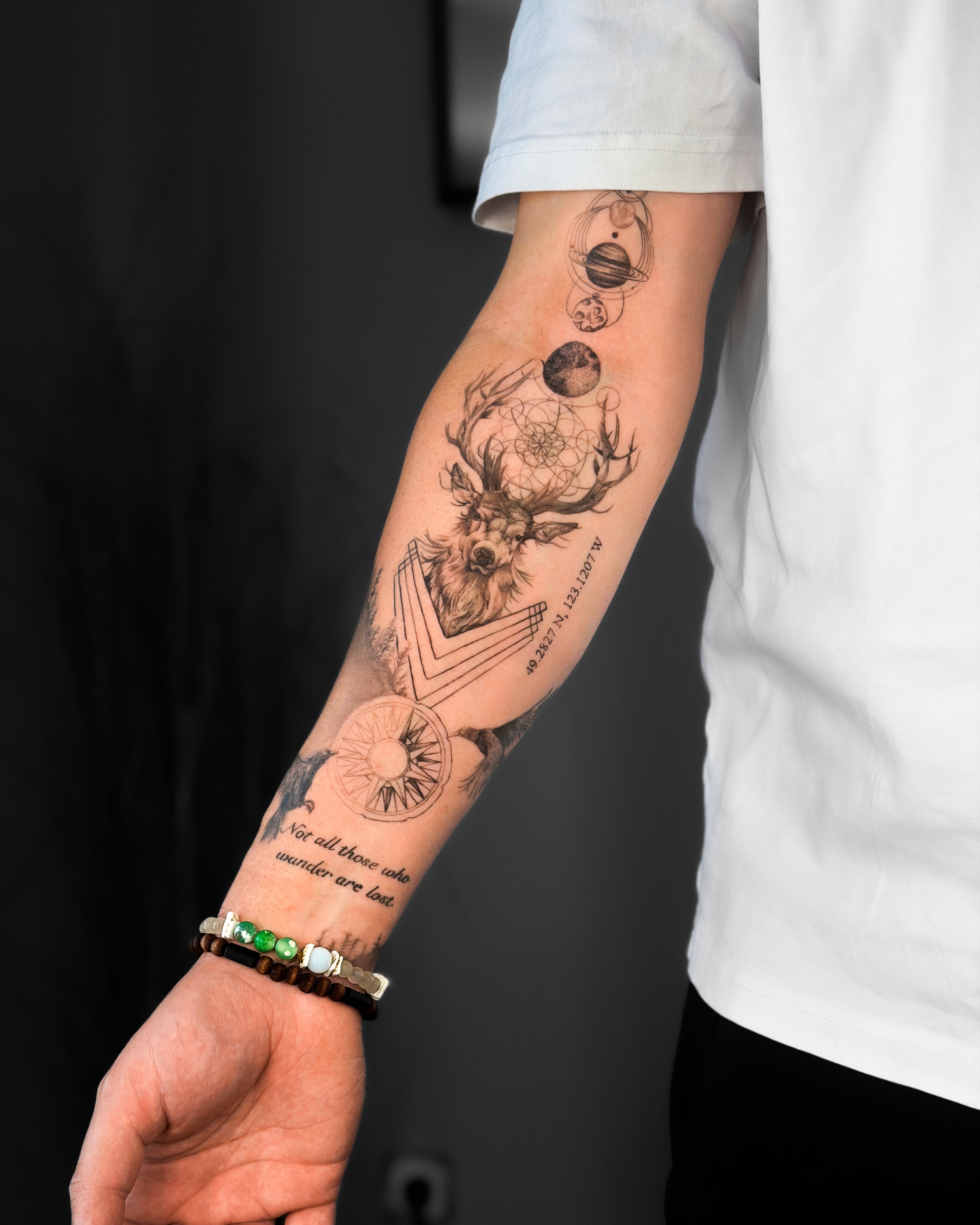Healed micro-realism lion tattoo with intricate geometric framing, fine-line moon phases, and sword detail, showcasing high-contrast shading and technical mastery.