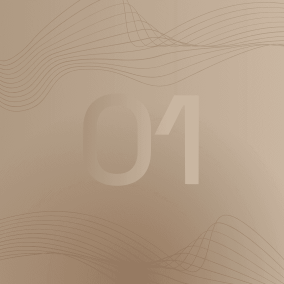 A focused woman with long red hair is seated at a desk, wearing a black blazer and dark blouse. She intently looks at camera, smiling slightly, with an open laptop in front of her. The setting is a warm and serene office setup in the background. Soft daylight filters through, creating a calm atmosphere. The composition captures her in a frontal profile with a clear emphasis on her concentration and the serene indoor setting.