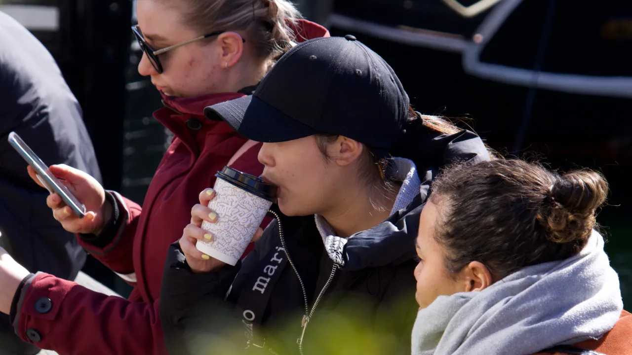 Turists in Copenhaen having a coffee from Rajissimo