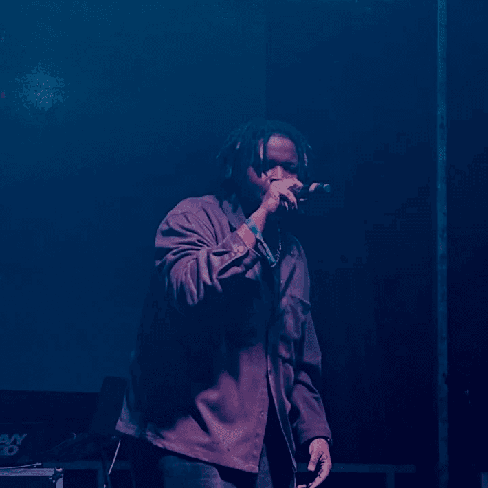 Artist Asiko performing rap