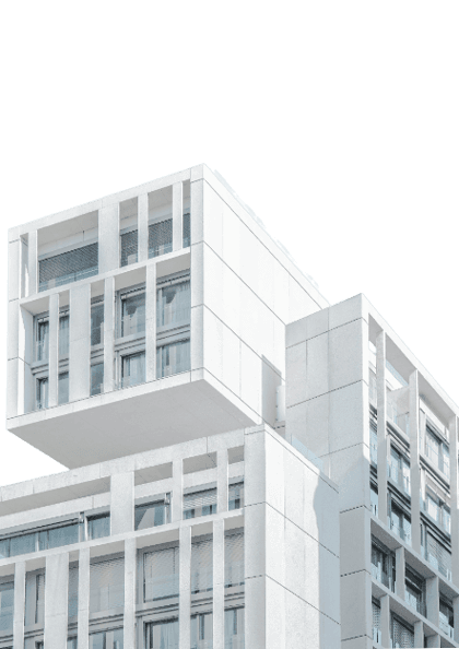 white modern cement building under blue sky