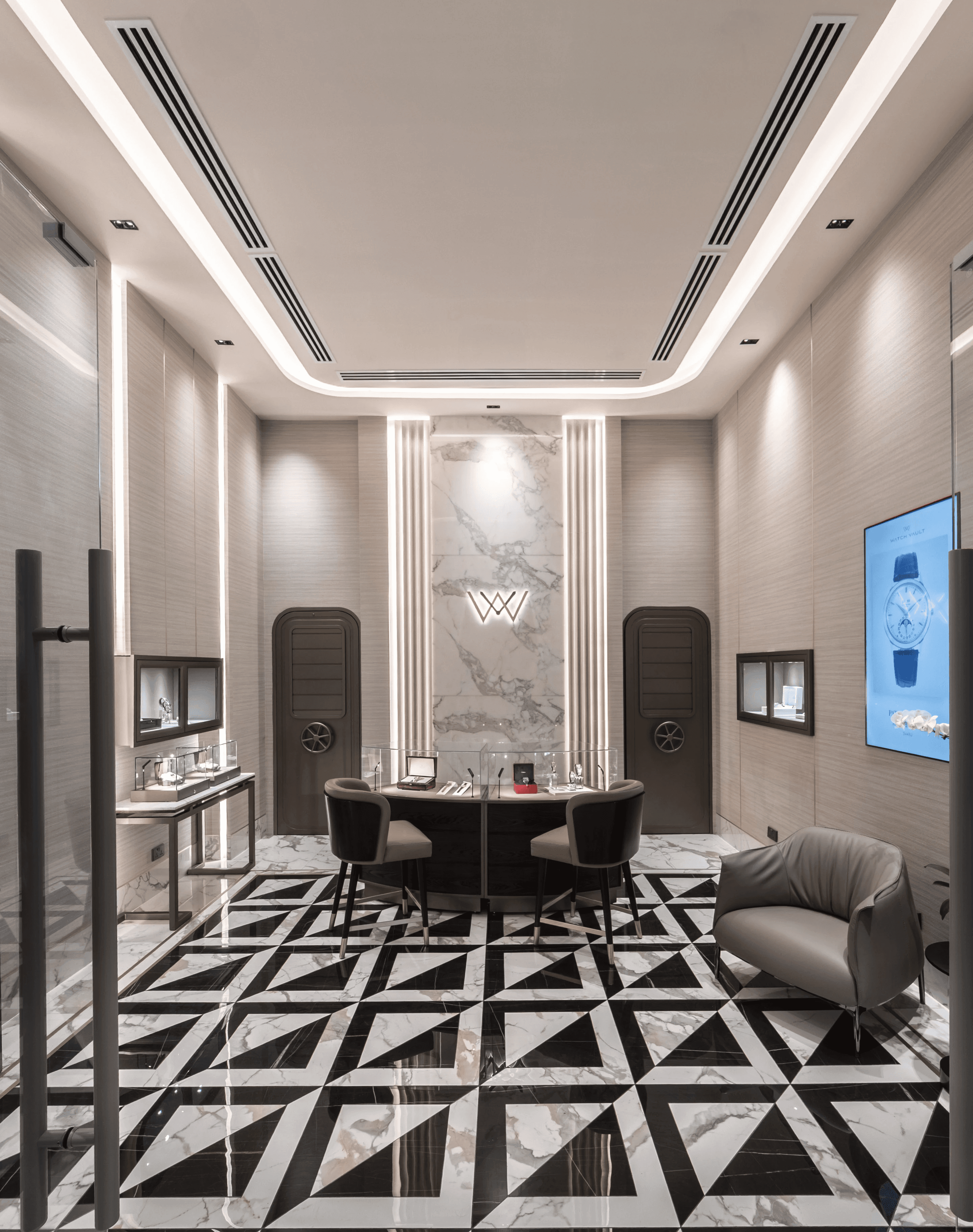 Luxurious office interior with a sleek desk, two chairs, and an elegant patterned floor.