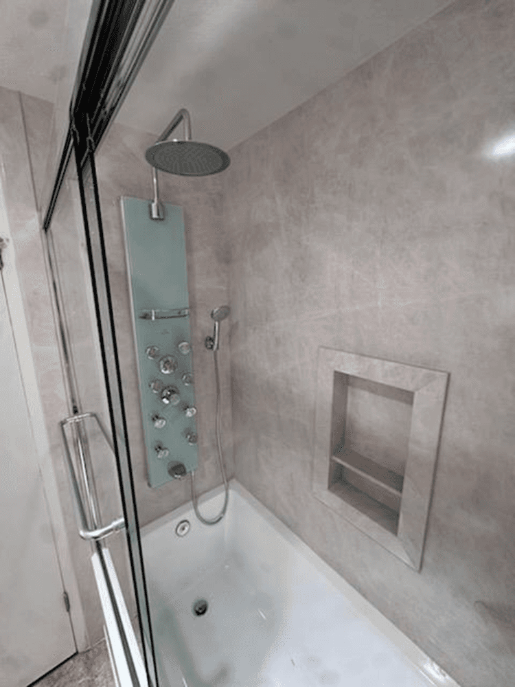 Walk in shower with shower spa and alcove