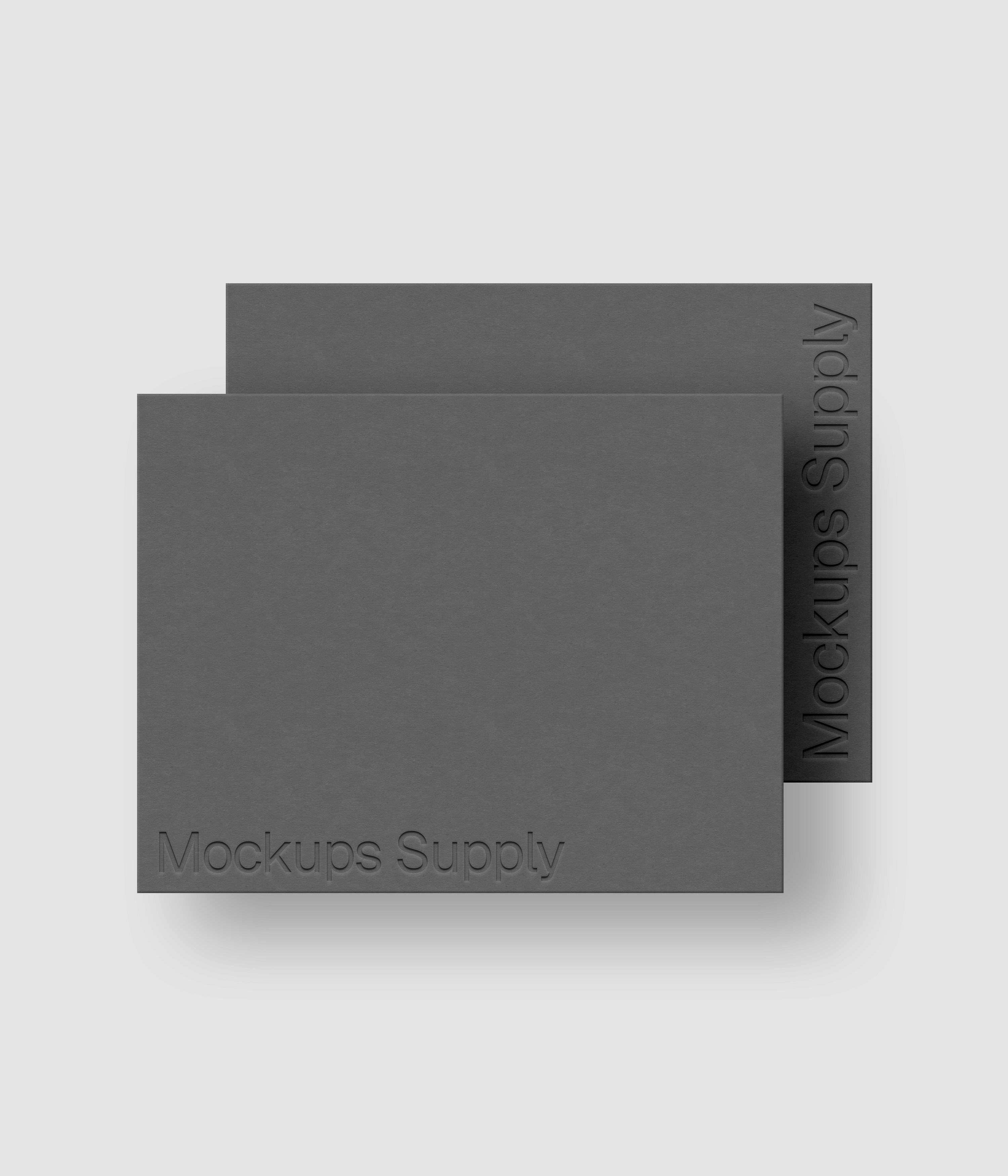 Two US Letter paper mockup PSD landscape with debossed logo effect, gray papers on white background, modern minimal stationery mockup for print design and brand identity