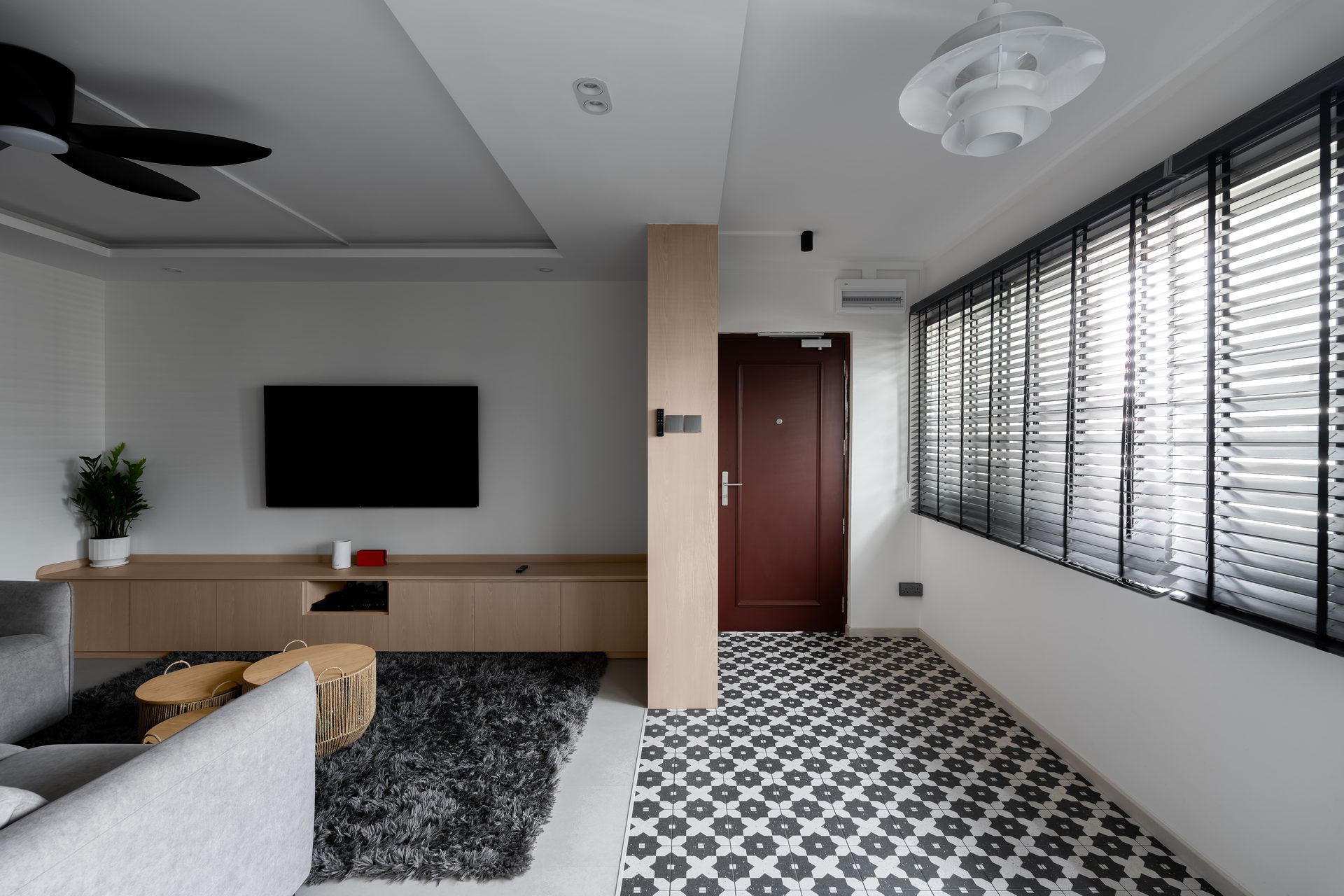 Black and white decorative tiles on foyer floor