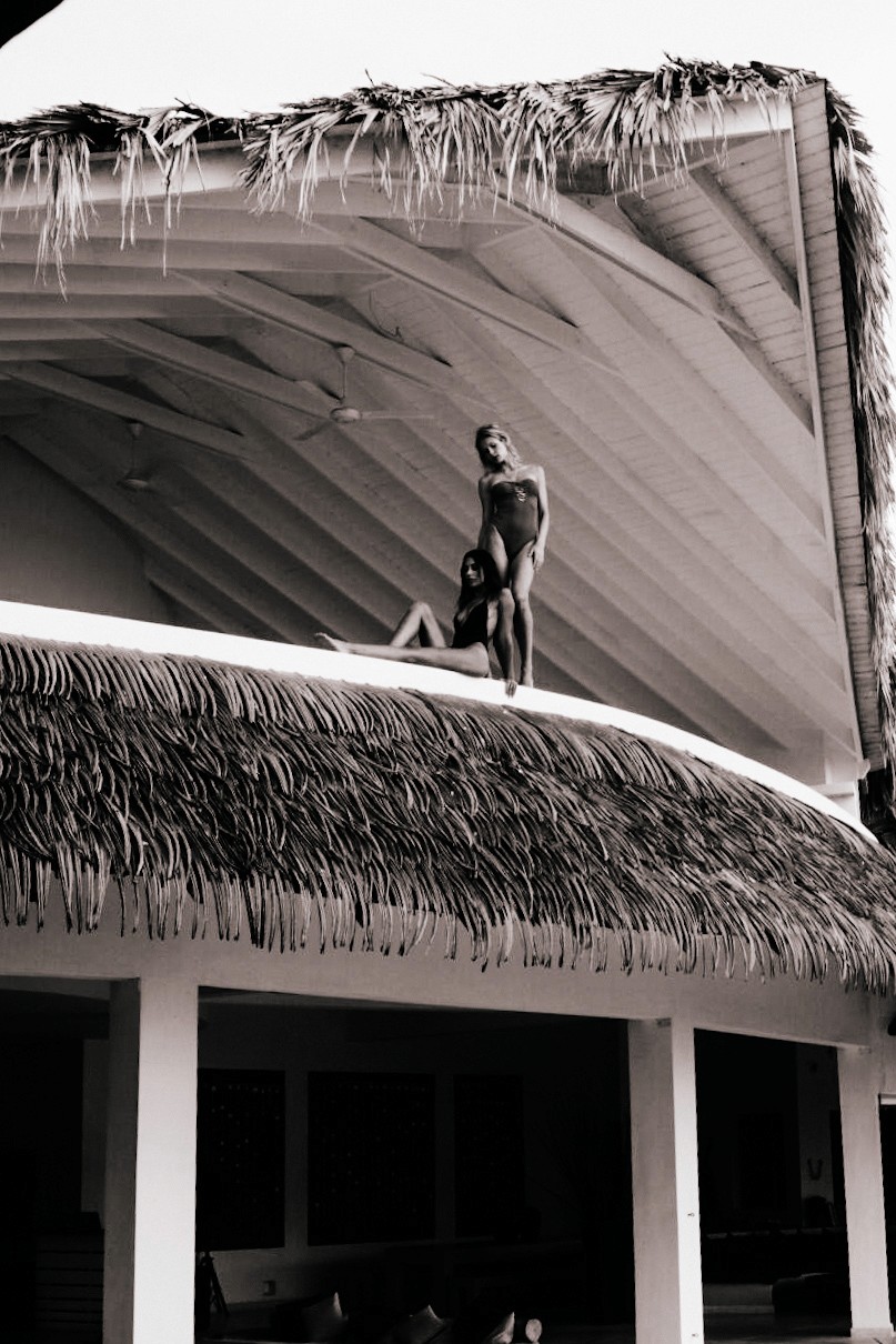 Ethan Harper is posing with umbrella