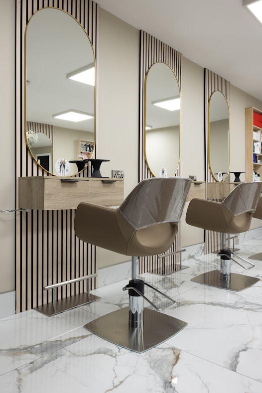 Elegant hair salon with styling chairs and mirrors