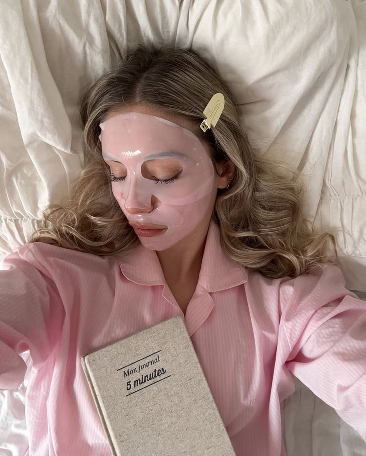 Close-up of a hand holding several monochrome instant photos