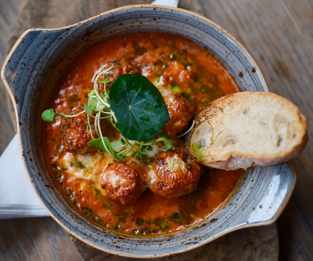 Pork & beef meatballs, rich tomato basil sauce, focaccia