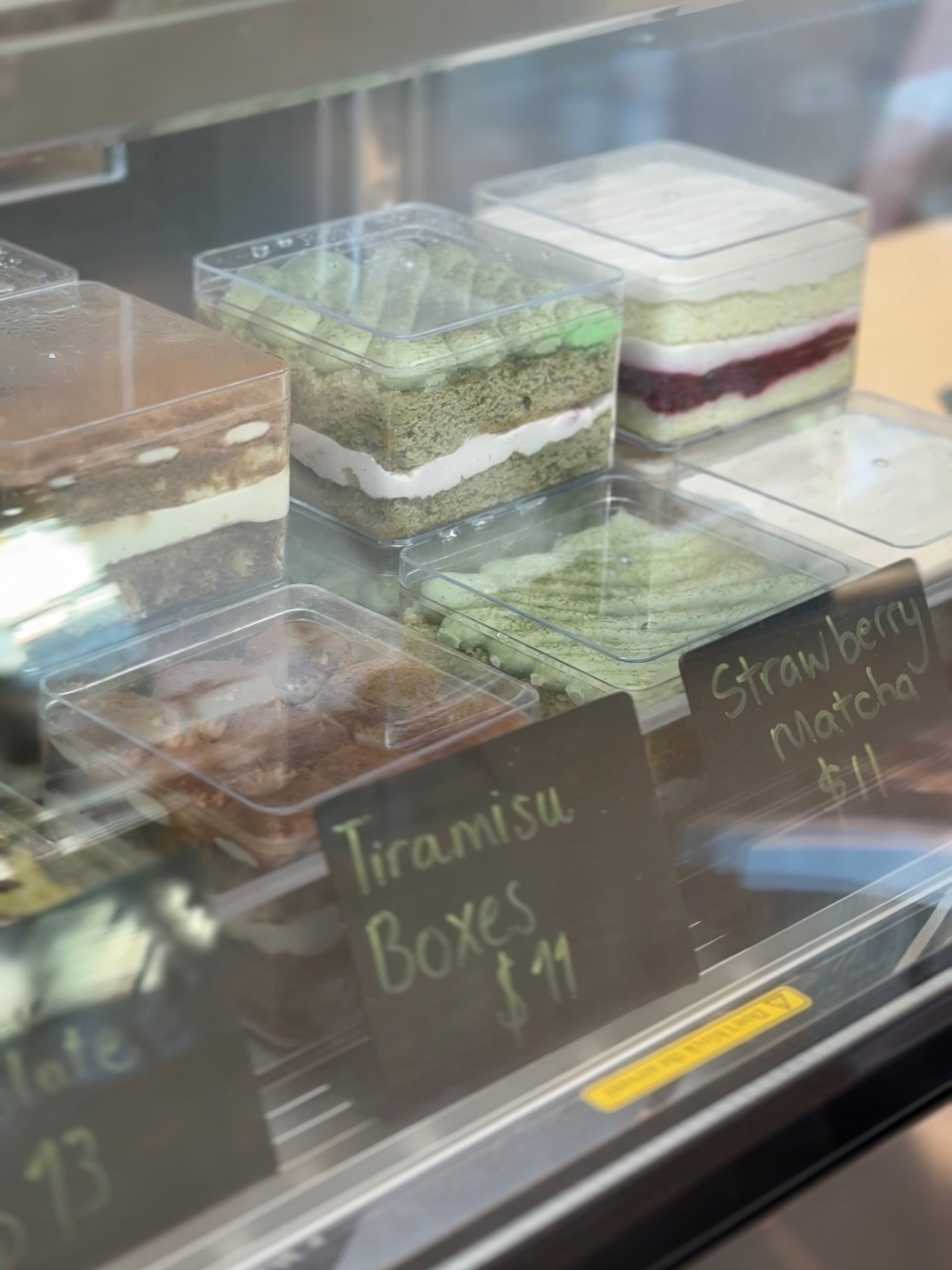 Tiramisu cake desserts inside of Trule Yours Cafe in Seattle