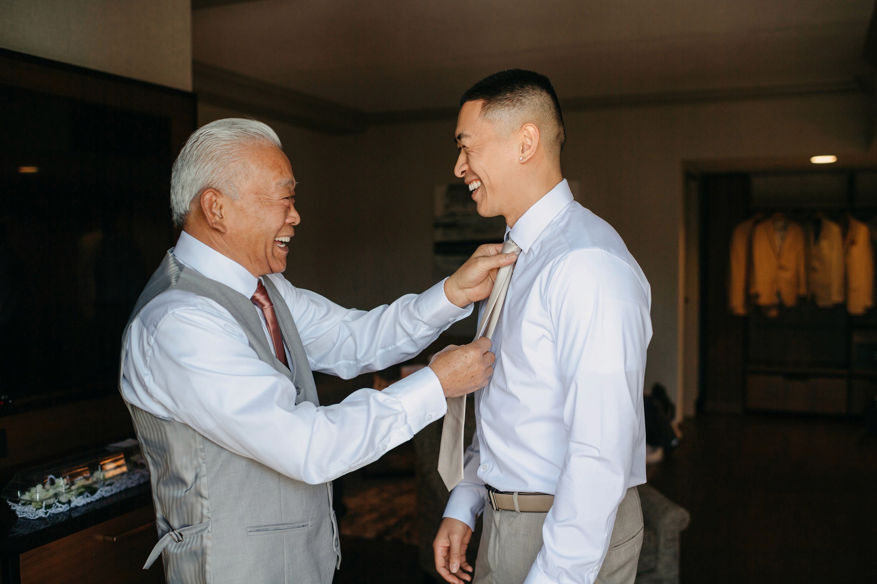 Flat lay wedding details with bouquet, rings, and sparkling bridal heels