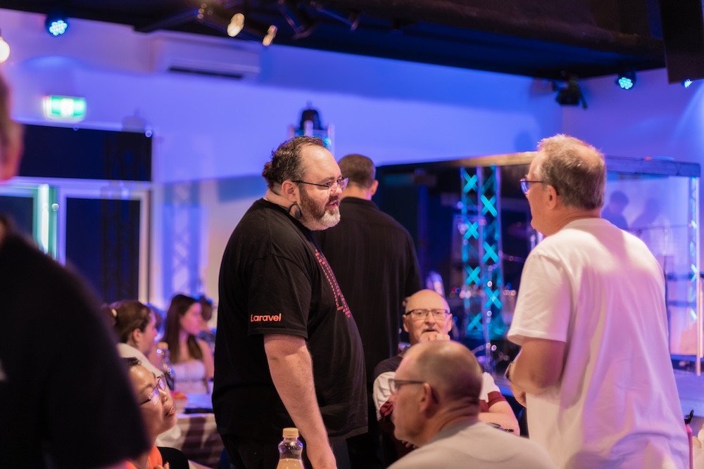 Collage of images with the word "REACH" repeated, showcasing diverse groups of people and activities.