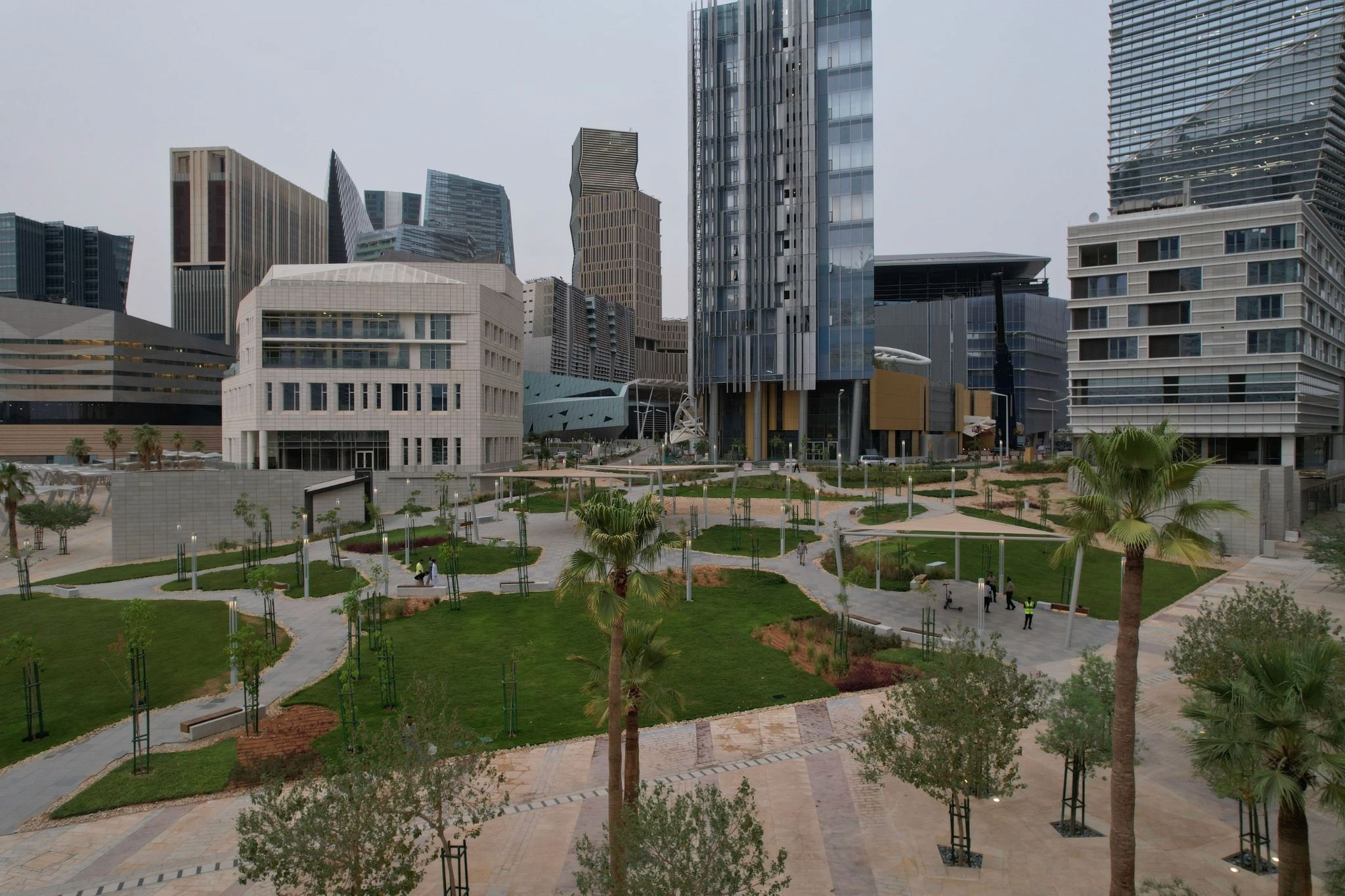 The Wadi at KAFD showing green spaces and relaxing walkways, reflecting the sustainability focus in the district.&nbsp;