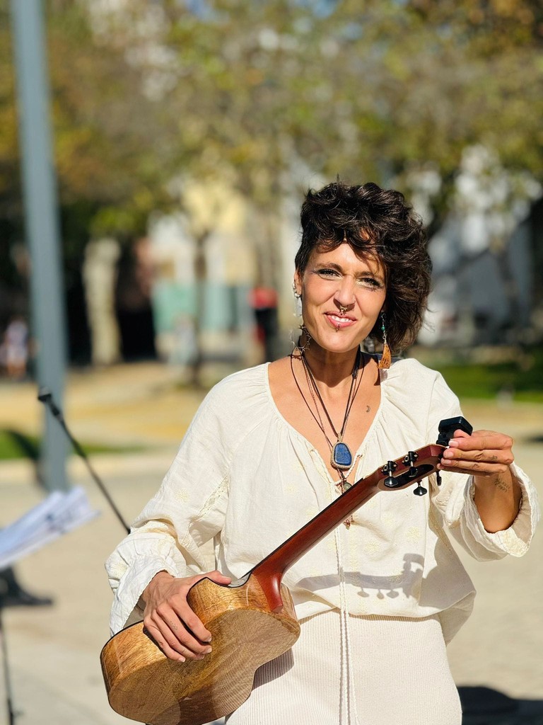 Shirtless man meditating indoors