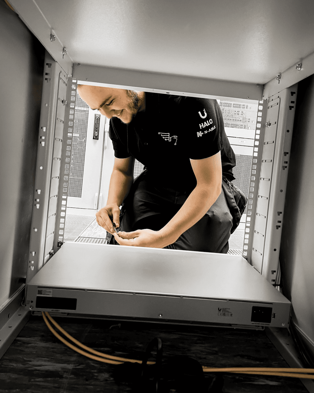 Creative workspace with large windows and a wall full of inspiration boards.