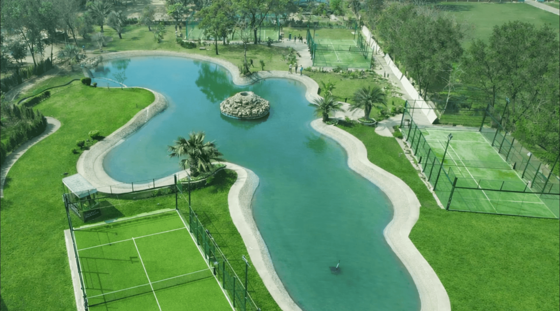 A close-up shot of a handcrafted welcome cocktail served at a Mediterranean hotel patio