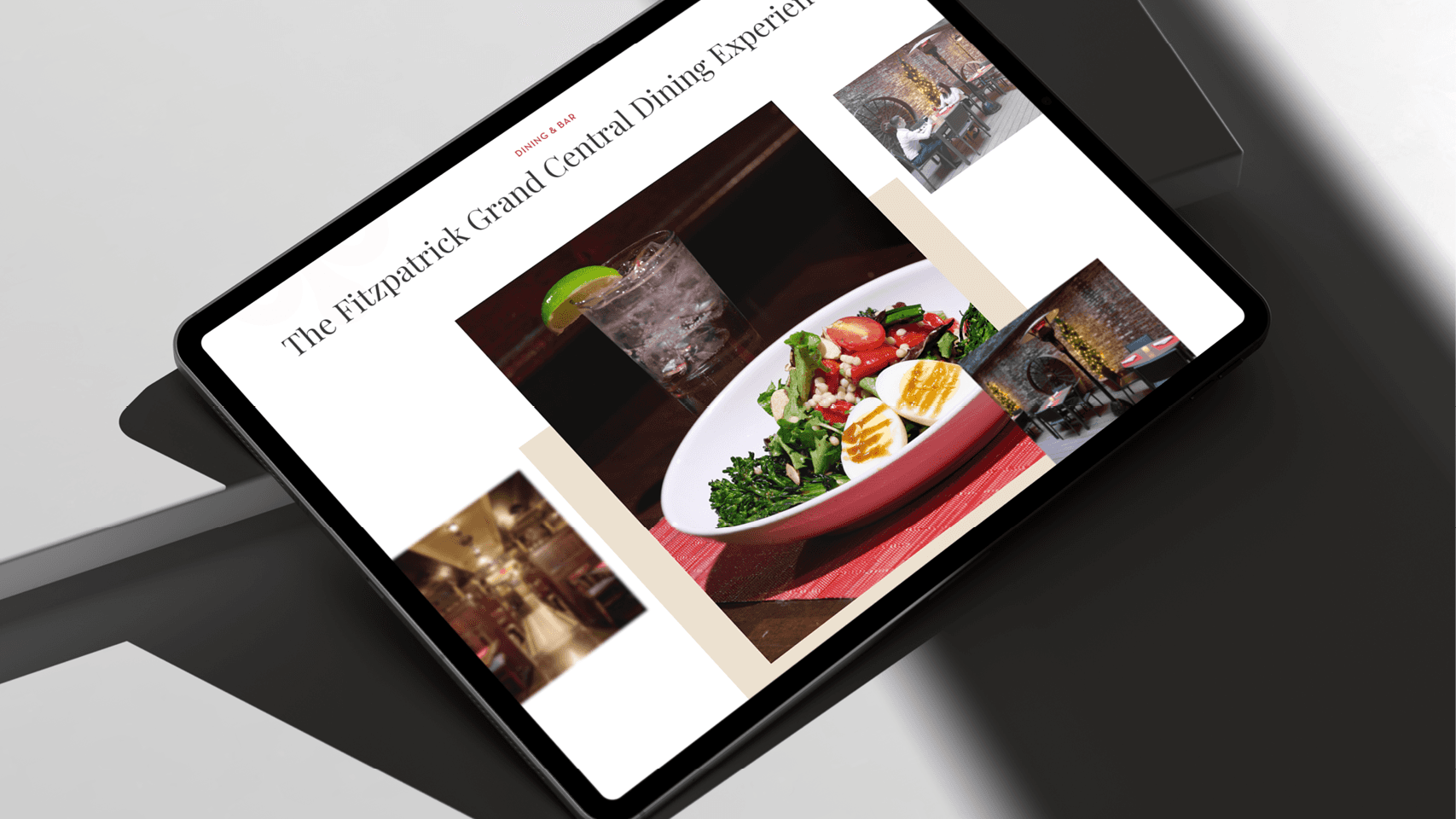 iPad leaned on a step showcasing the Fitzpatrick Hotel website