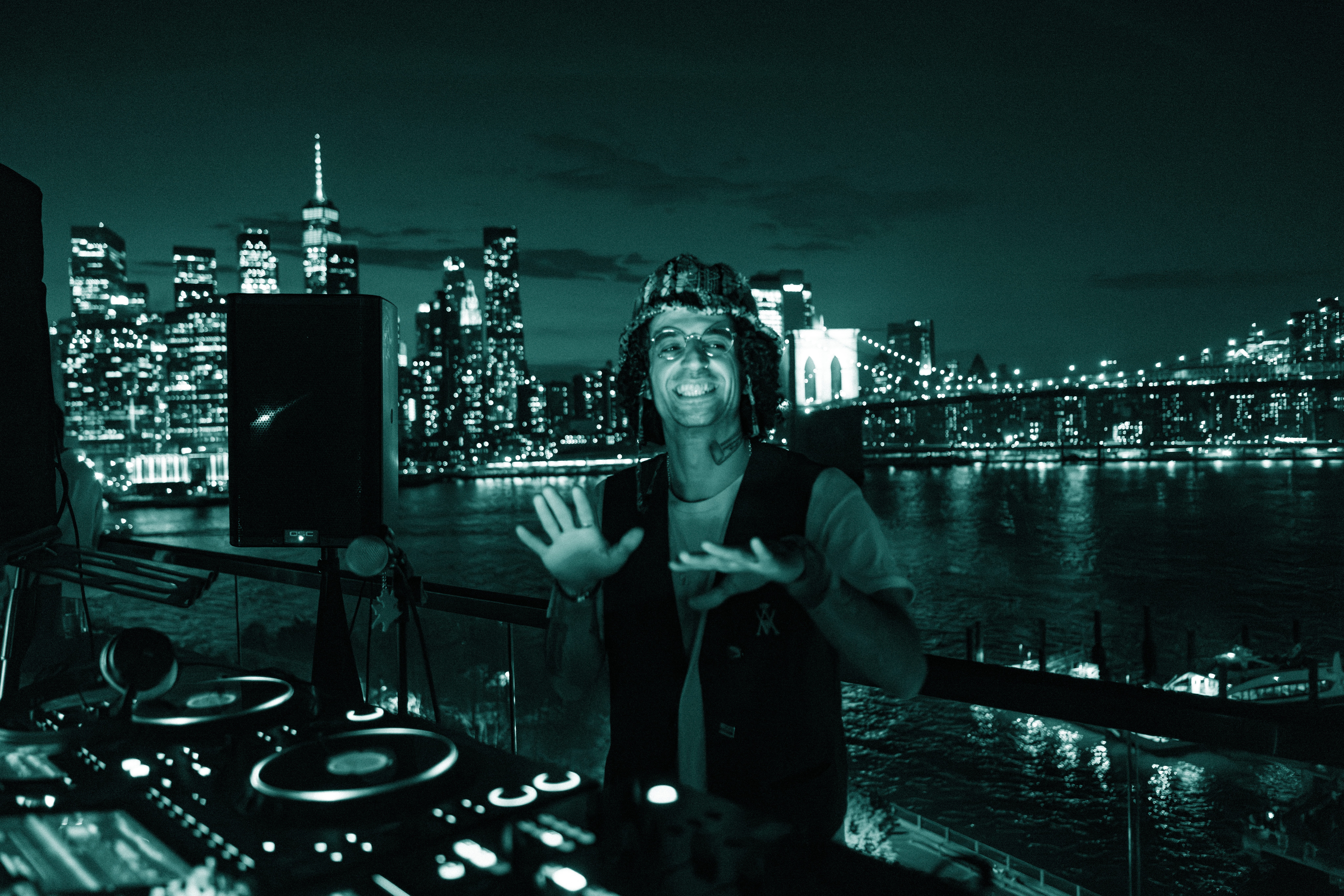 A bottle of daisy perfume with floral accents.