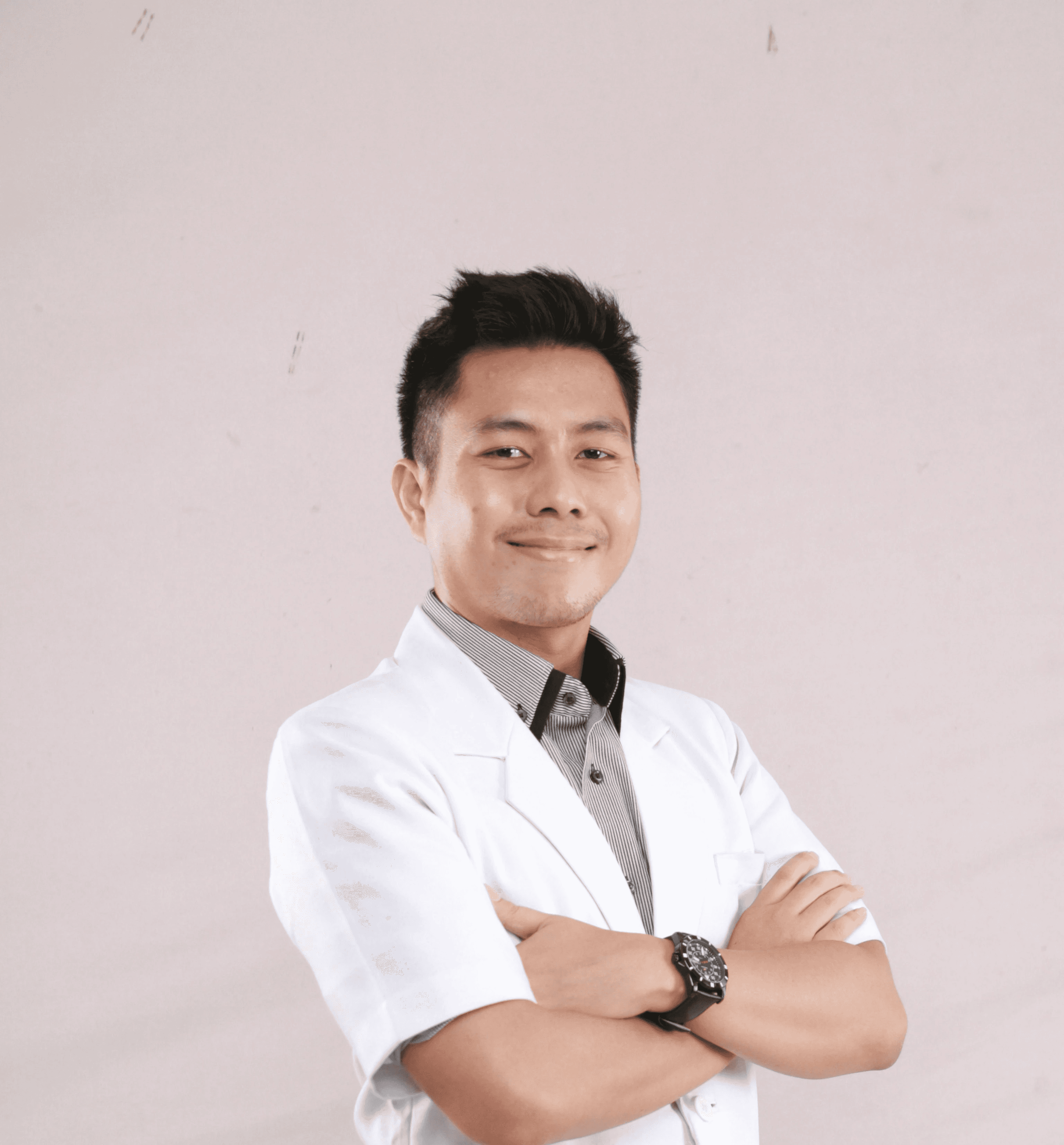 a man in a white shirt and tie posing for a picture