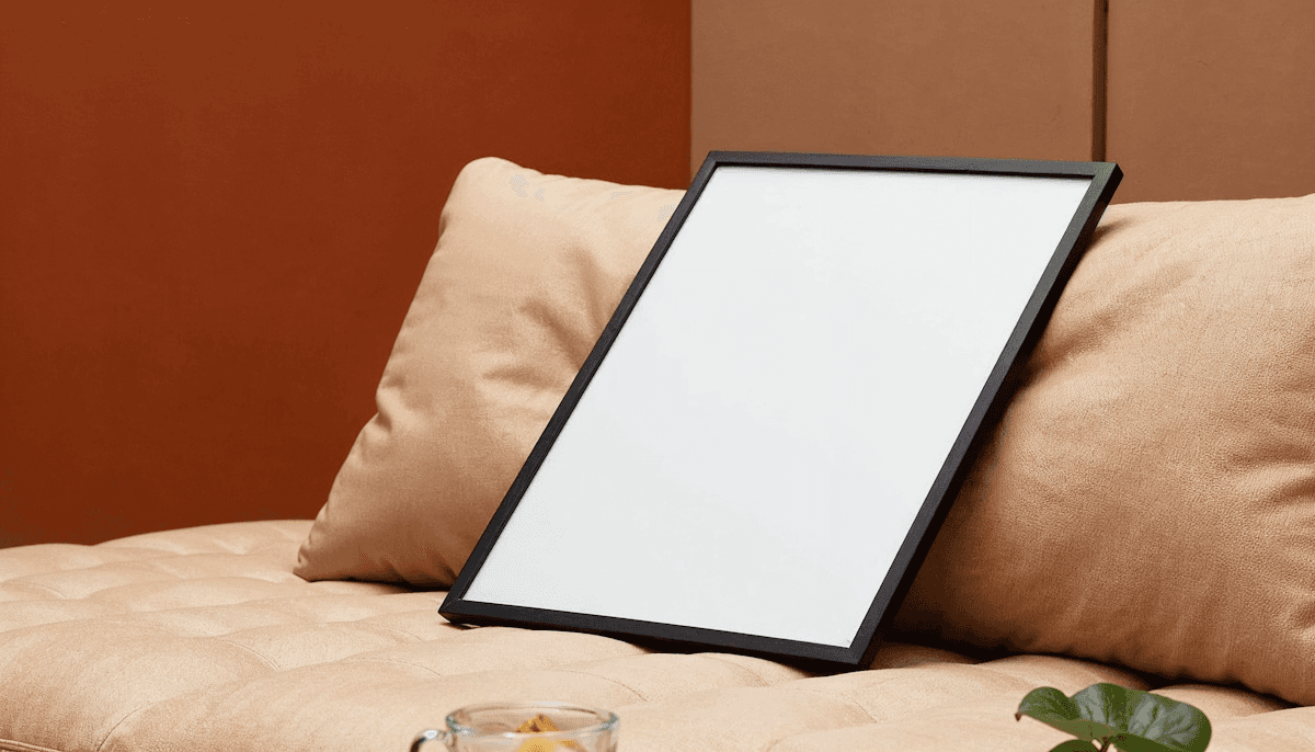 Tablet resting on a pillow in a cozy setting.