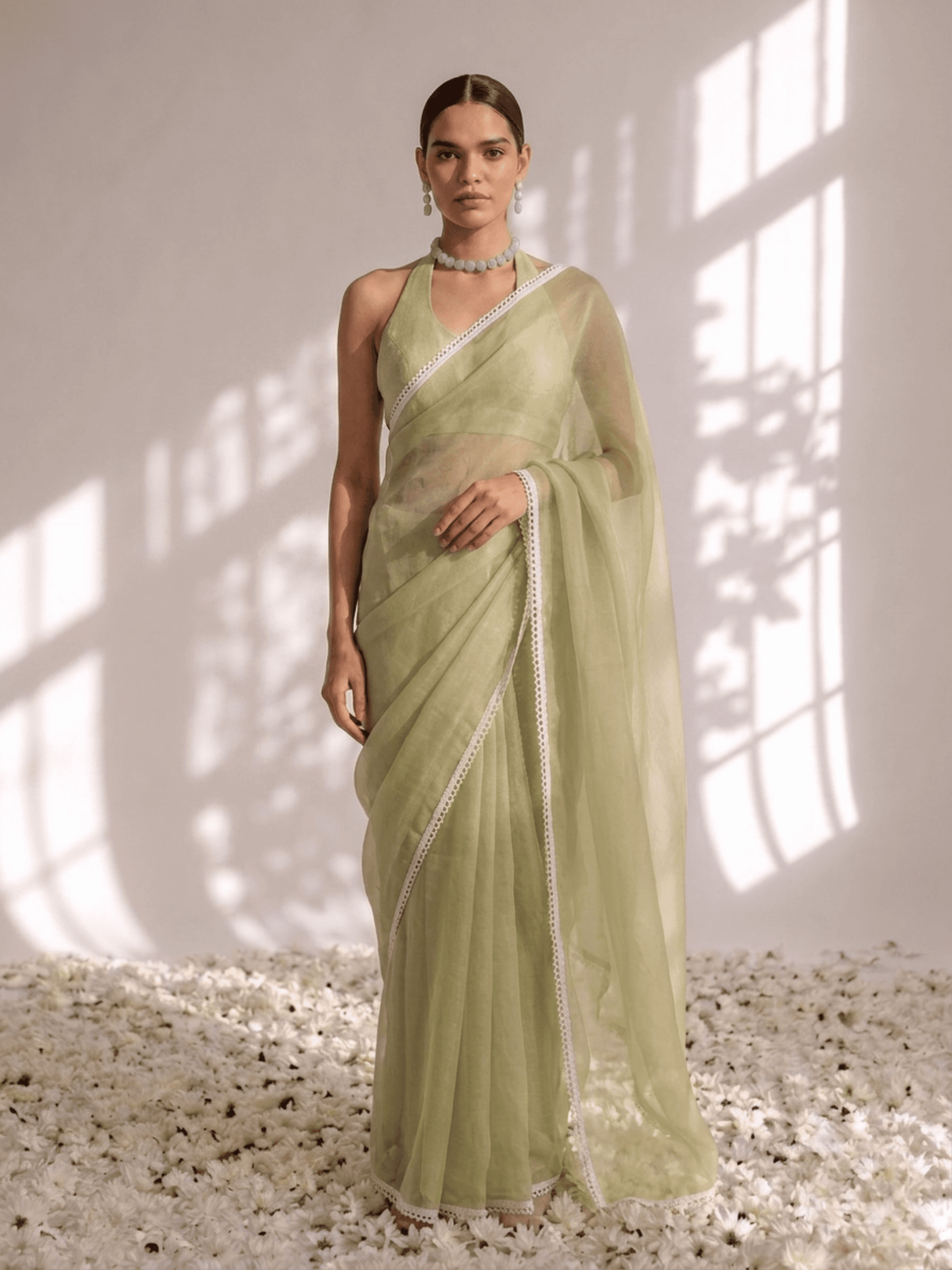 Sage green chiffon saree with white lace border by Swtantra, ₹2,799