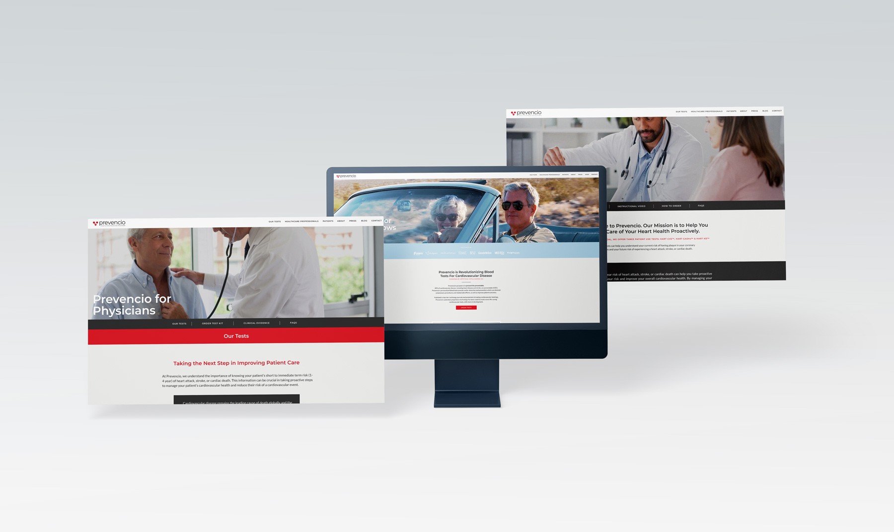 Red dresses arranged on mannequins and in piles, creating a striking fashion display