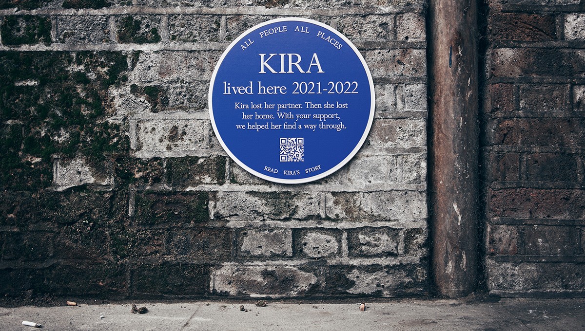 Blue plaque on a wall