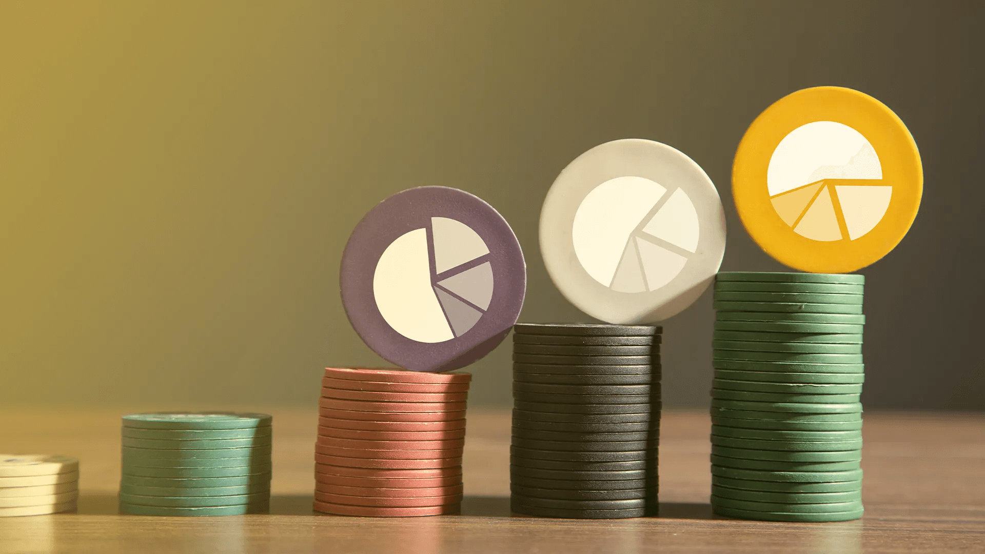 Stacked coins with pie chart icons - Tokenomics Examples