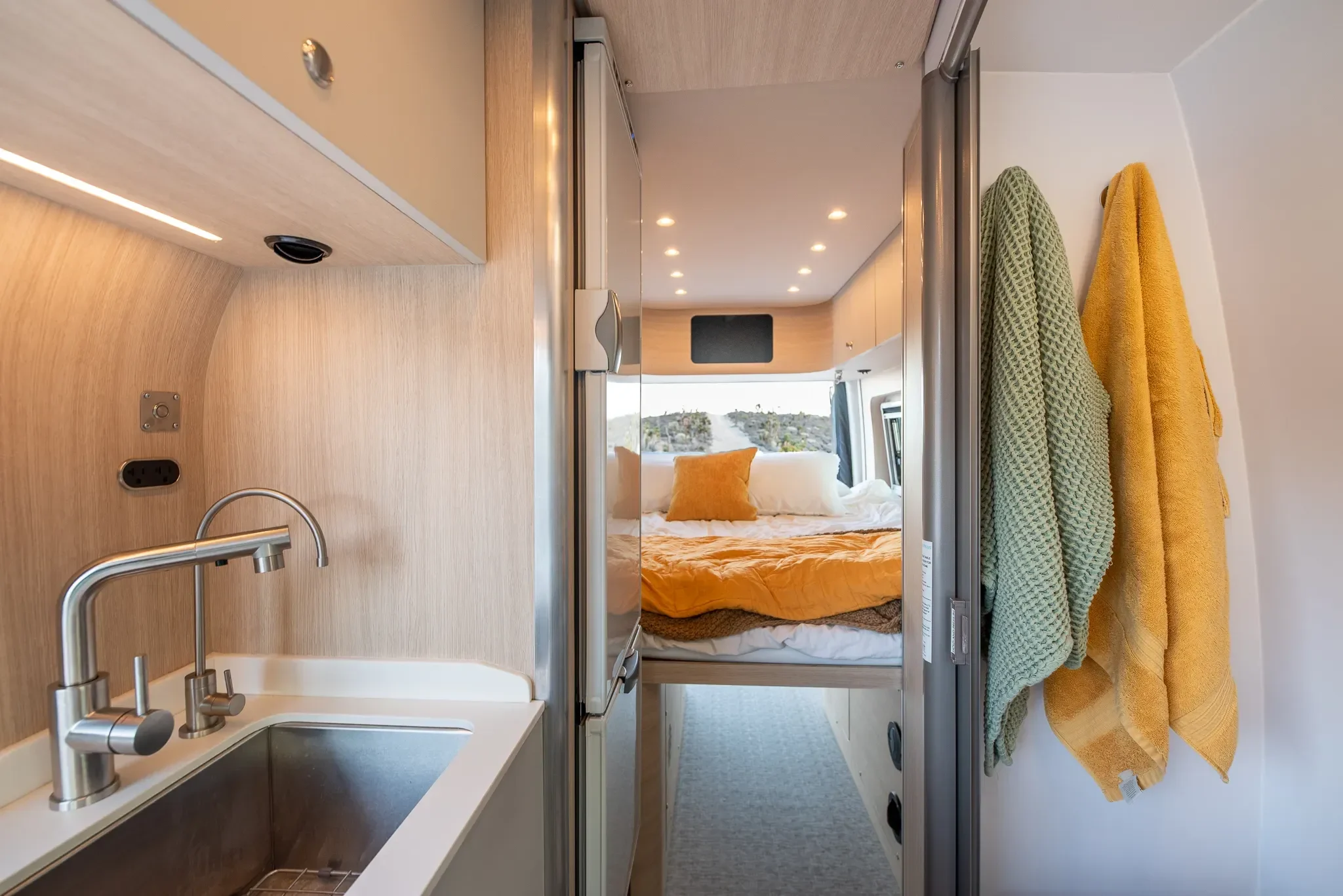 interior bed space of a stylish camper van