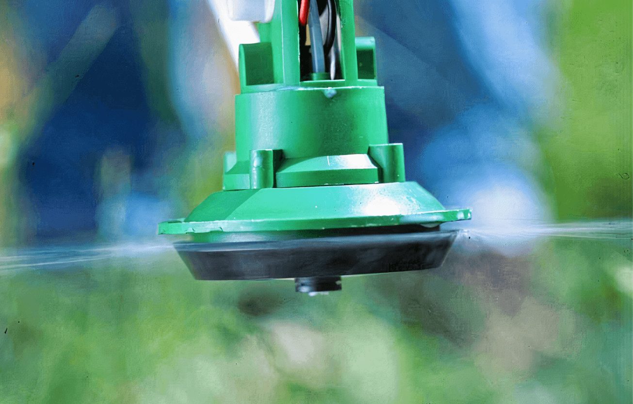 A futuristic concept car is parking in front of a modern building