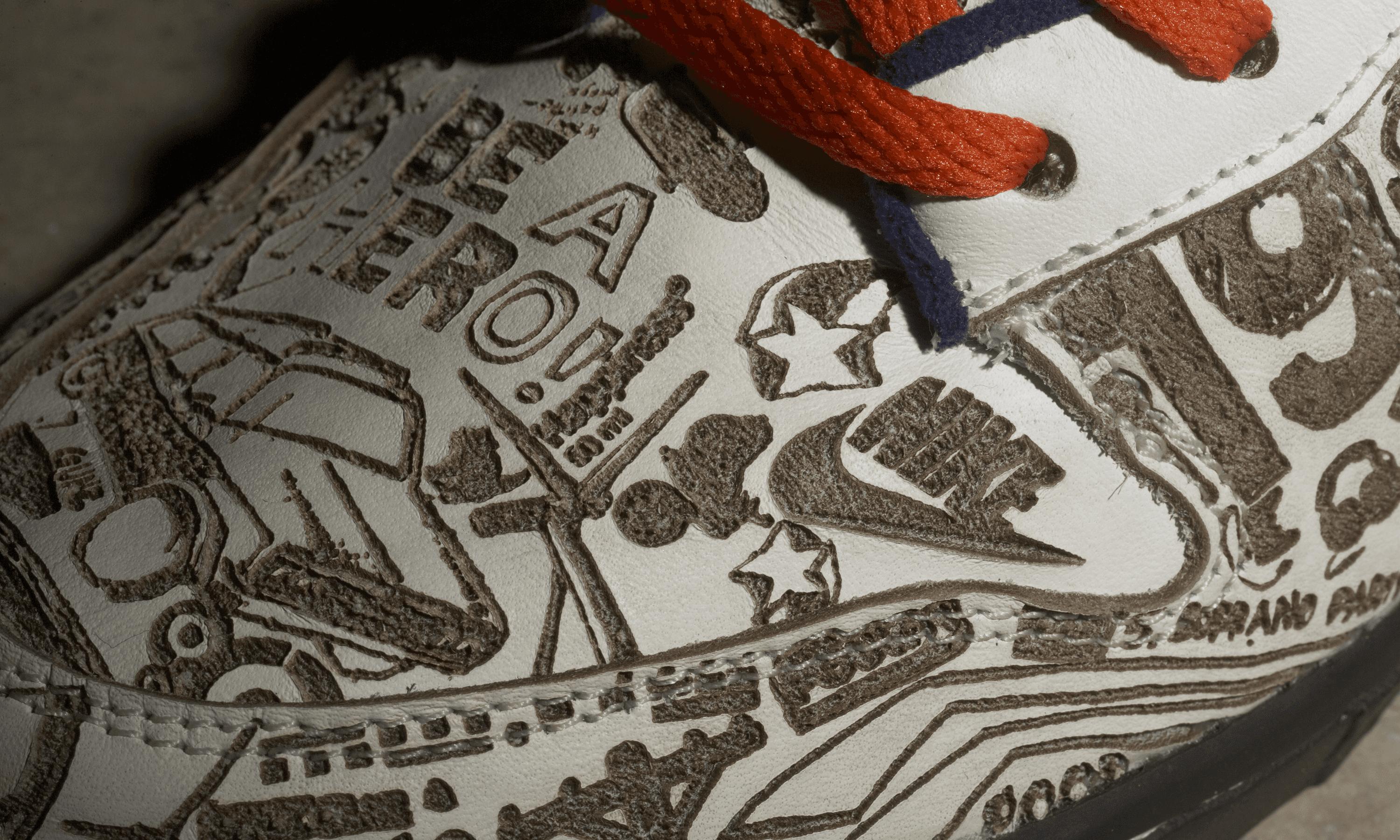 tight crop, detail of custom lasered nike dunk shoes